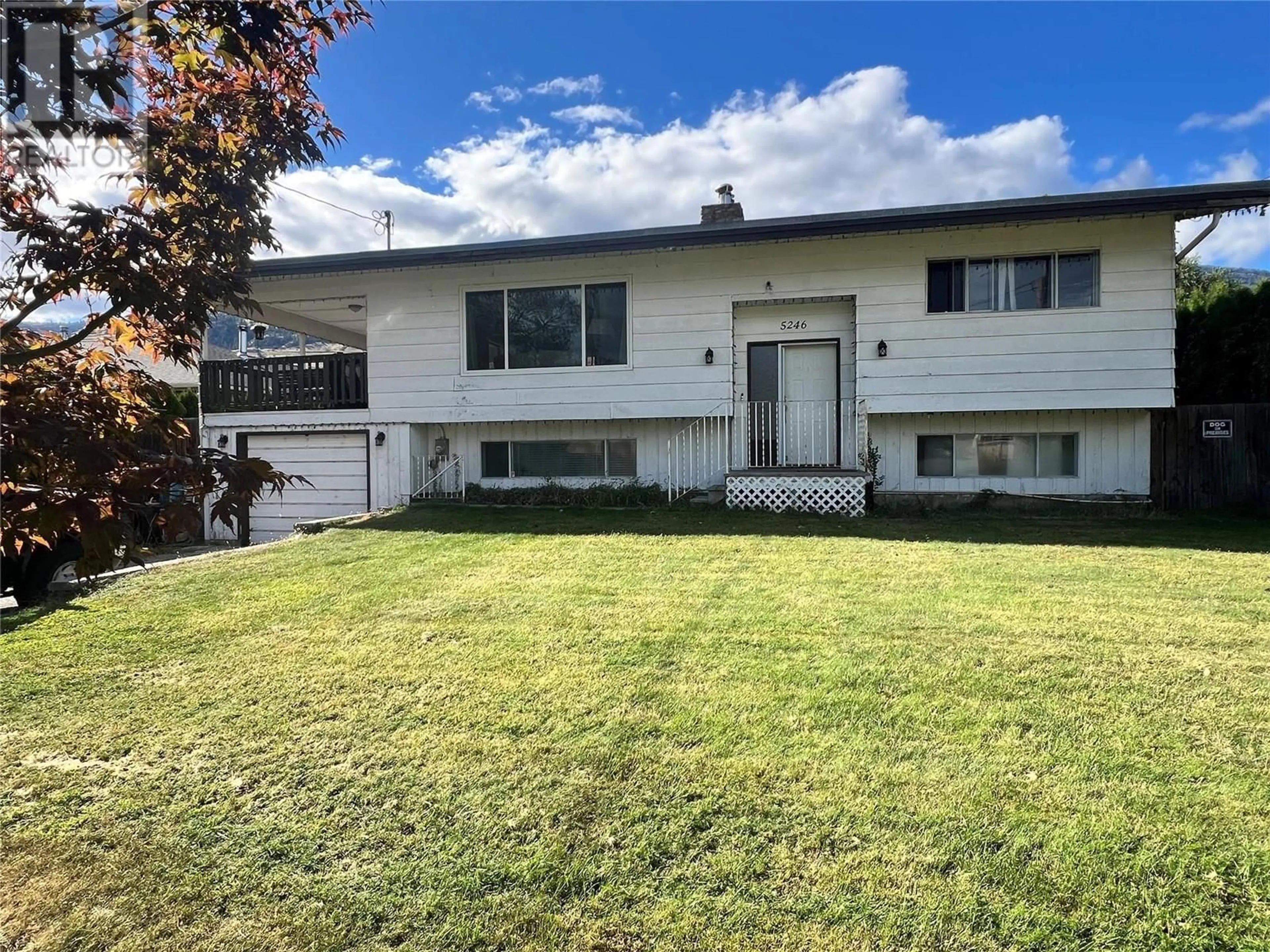 Home with vinyl exterior material, street for 5246 HAYNES ROAD, Oliver British Columbia V0H1T1