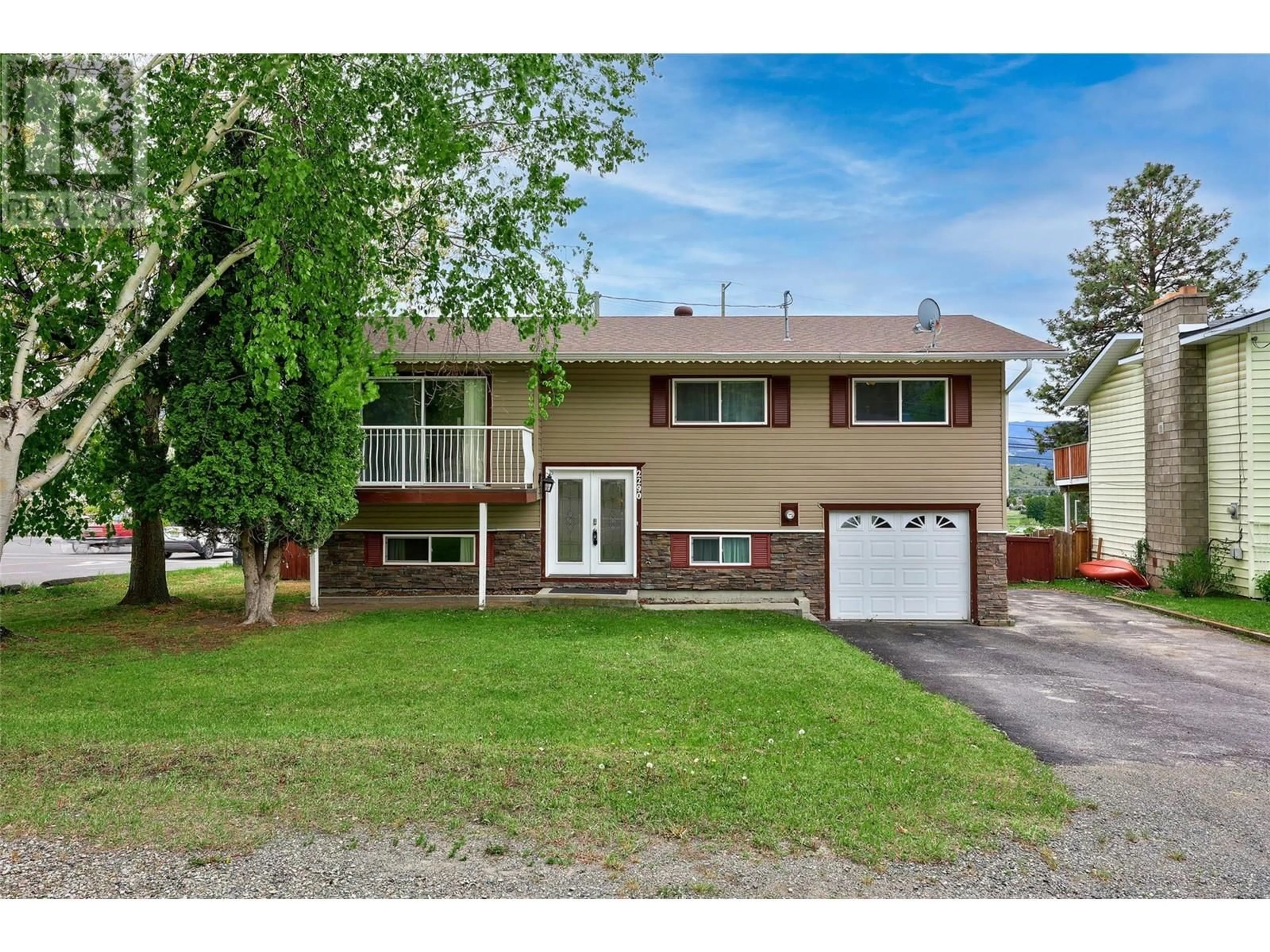 Home with vinyl exterior material, street for 2290 PARKER DRIVE, Merritt British Columbia V1K1J1