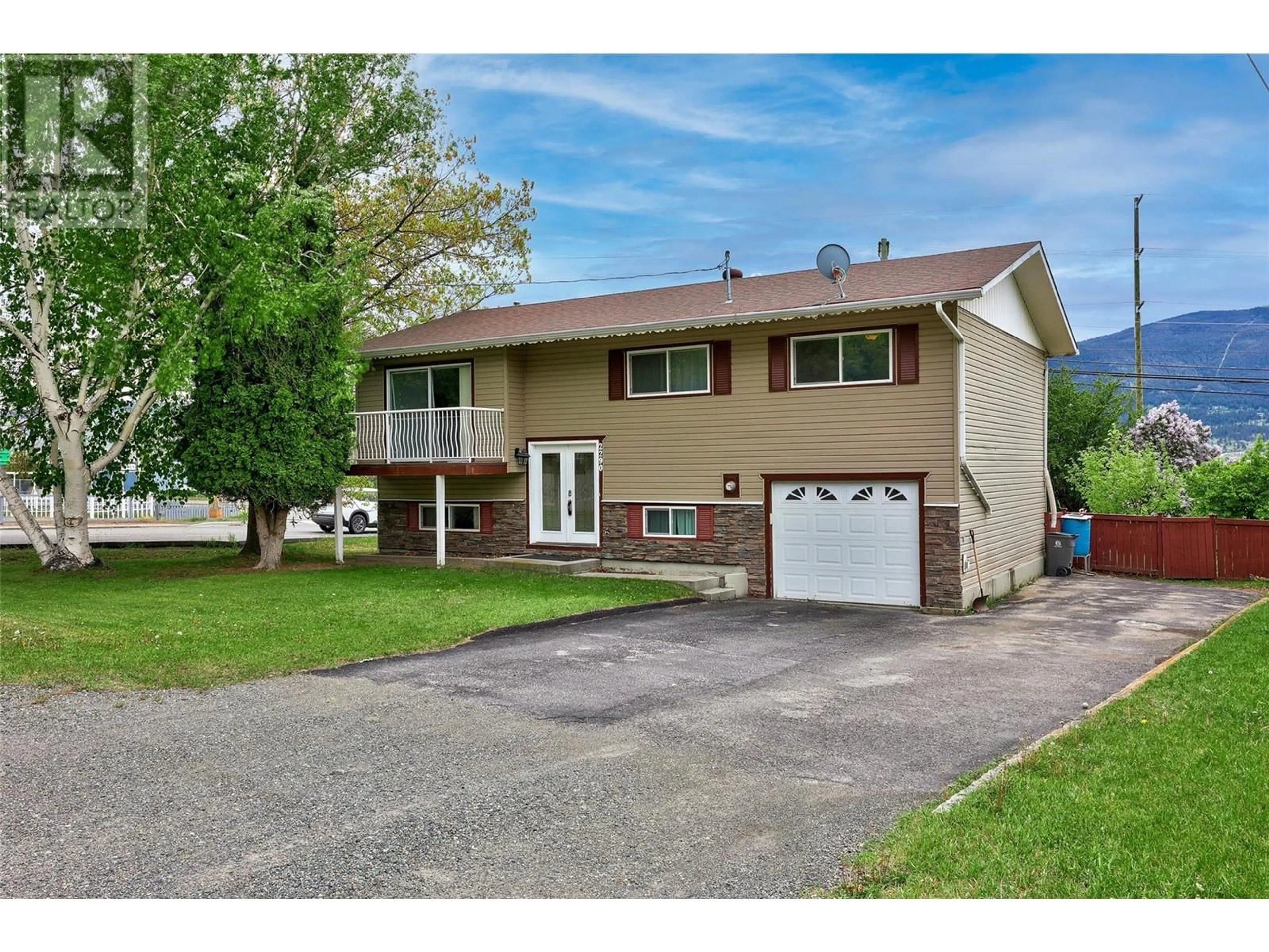 Home with vinyl exterior material, street for 2290 PARKER DRIVE, Merritt British Columbia V1K1J1