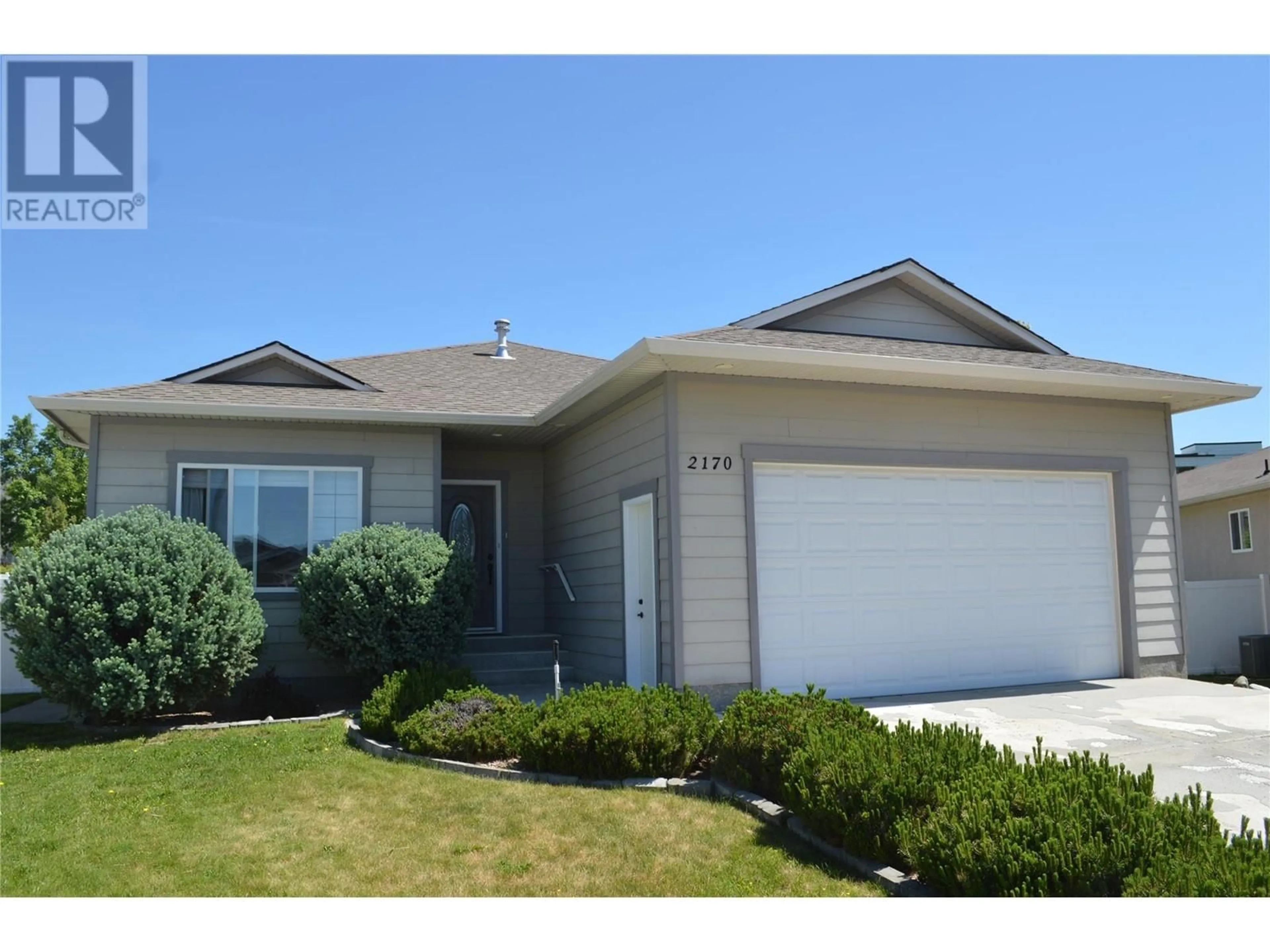 Home with vinyl exterior material, street for 2170 BRYCEN PLACE, Grand Forks British Columbia V0H1H0