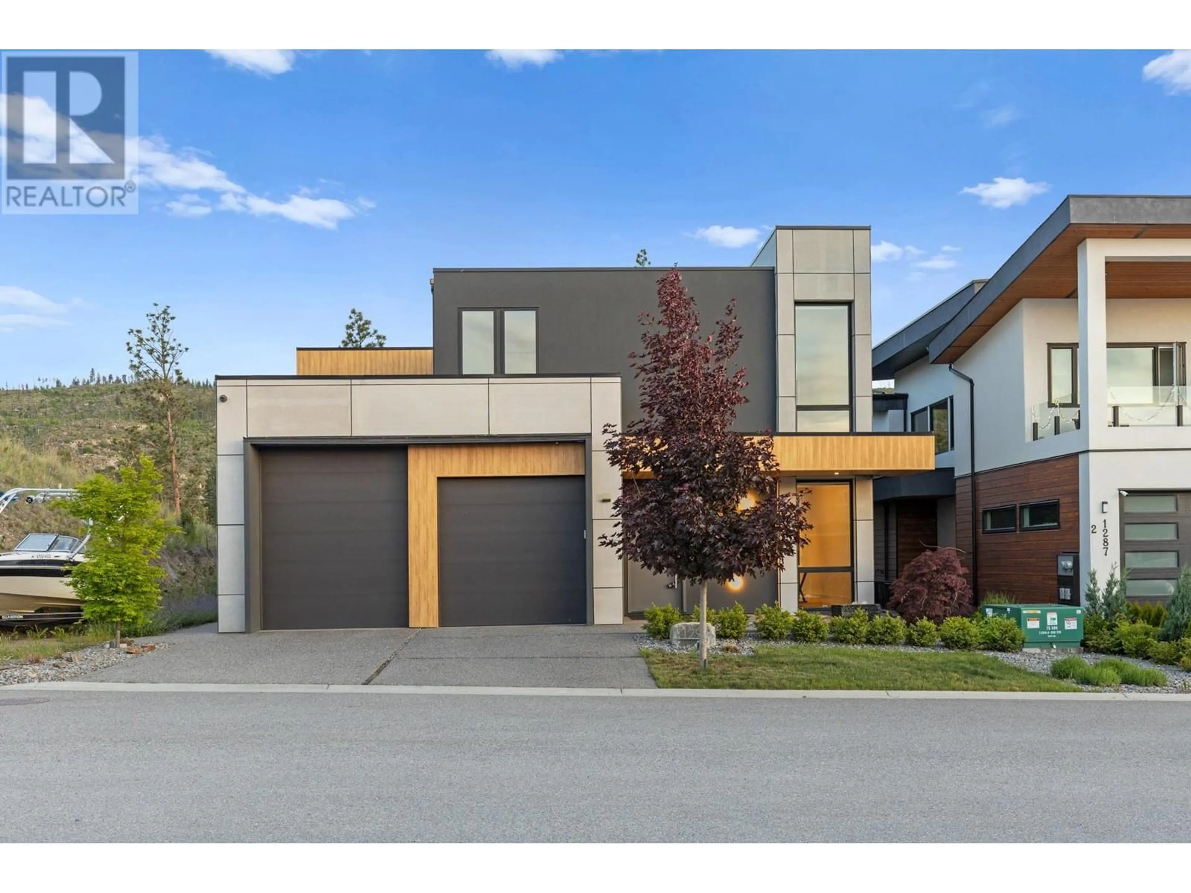 Home with brick exterior material, street for 1297 JACK SMITH ROAD, Kelowna British Columbia V1W5K7