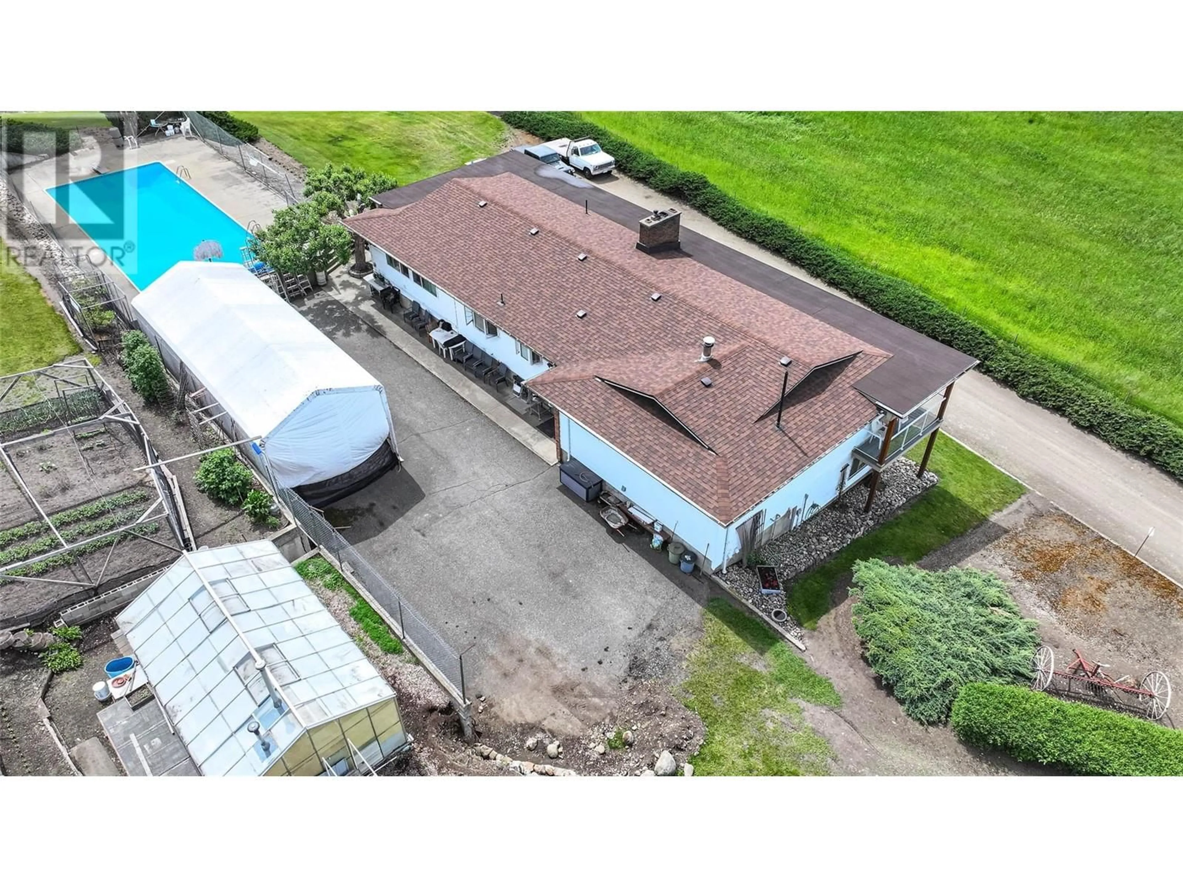 A pic from outside/outdoor area/front of a property/back of a property/a pic from drone, building for 5541 DIXON DAM ROAD, Vernon British Columbia V1B3J7