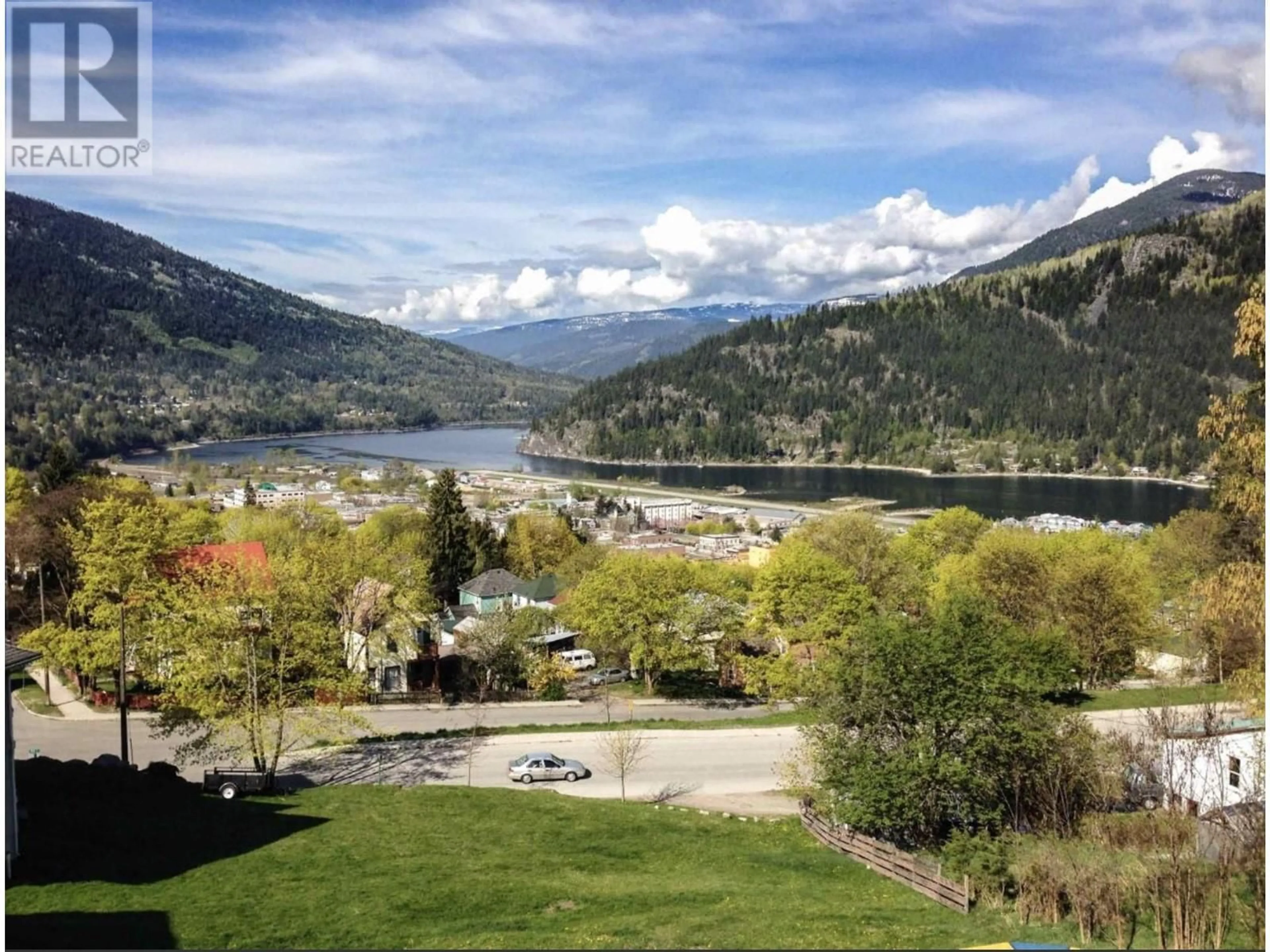 A pic from outside/outdoor area/front of a property/back of a property/a pic from drone, water/lake/river/ocean view for 1015 CARBONATE STREET, Nelson British Columbia V1L4R6