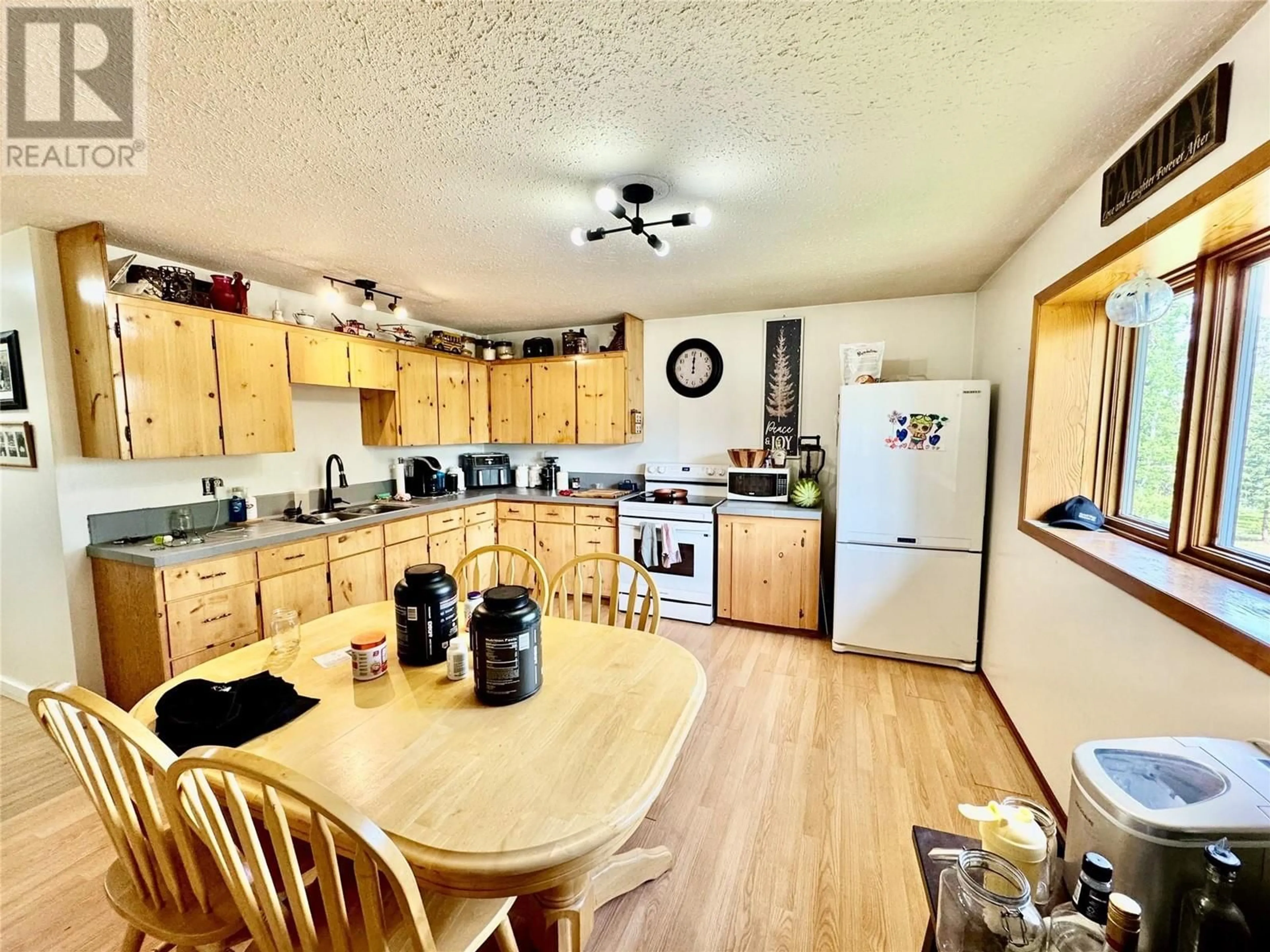 Standard kitchen, wood/laminate floor for 455 204 ROAD, Pouce Coupe British Columbia V0C2C0