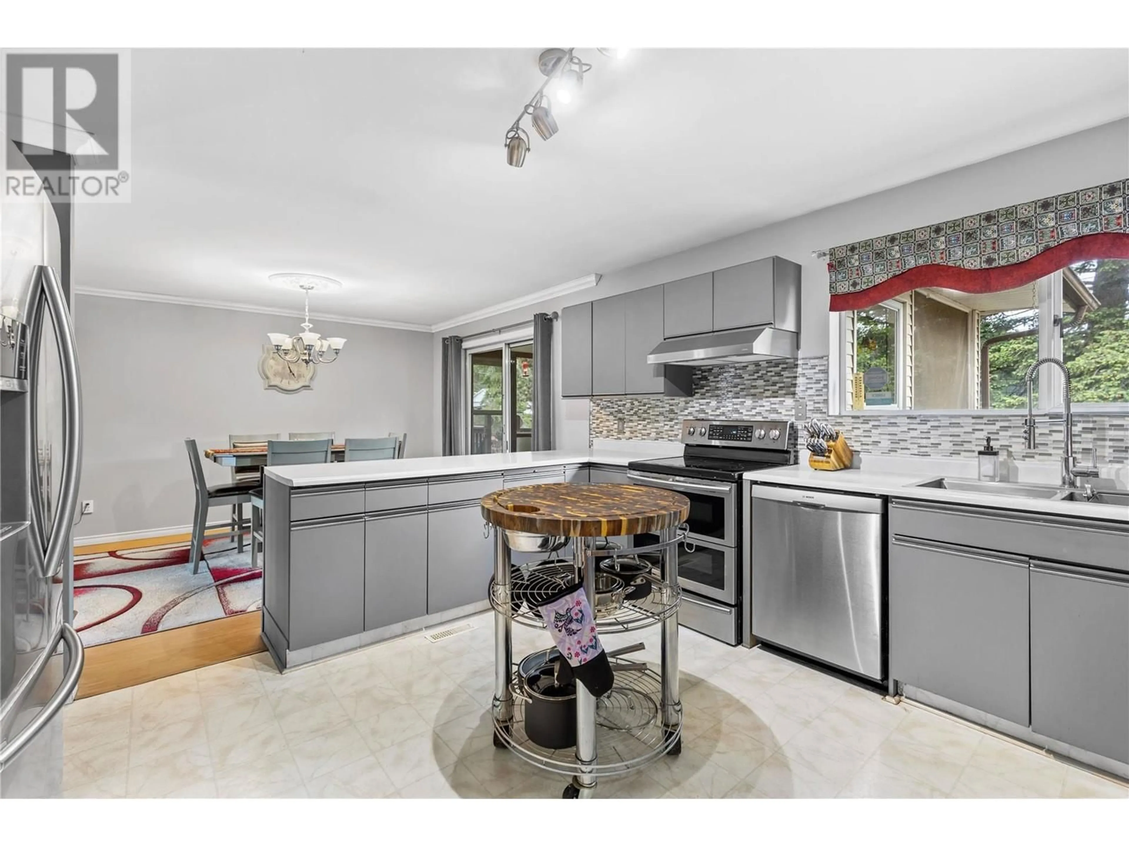 Open concept kitchen, ceramic/tile floor for 704 BRADFORD ROAD, Barriere British Columbia V0E1E0