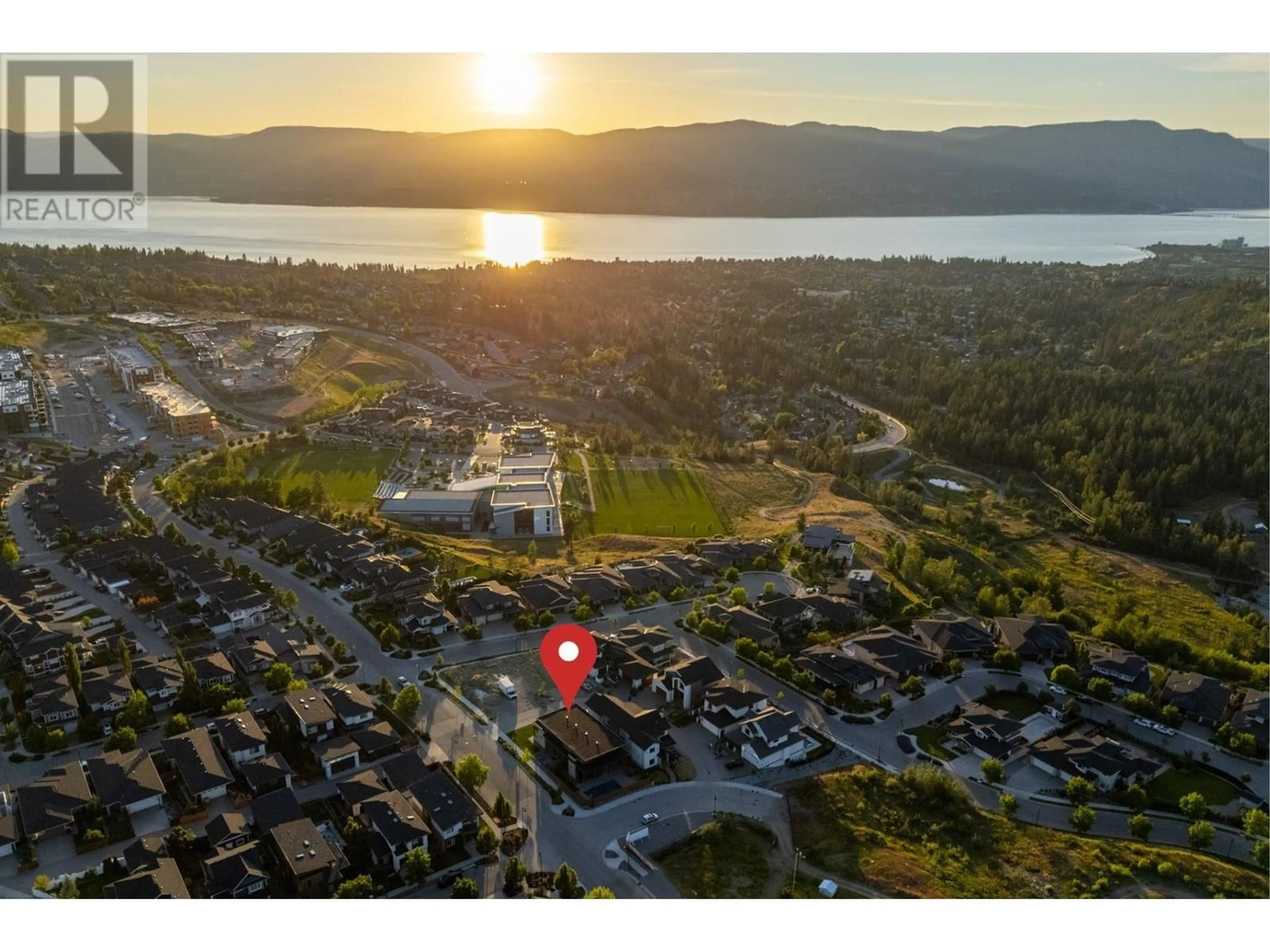 A pic from outside/outdoor area/front of a property/back of a property/a pic from drone, water/lake/river/ocean view for 4983 BUCKTAIL LANE, Kelowna British Columbia V1W5L3