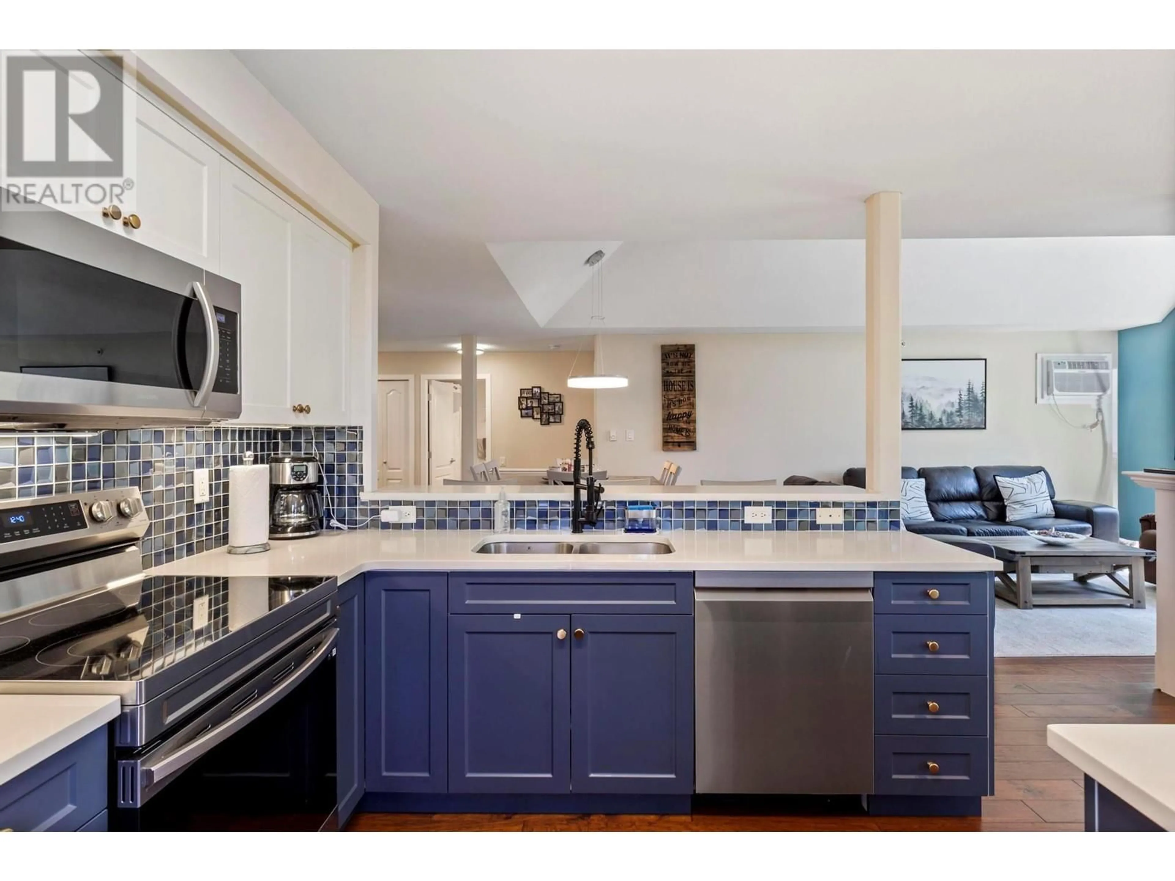 Open concept kitchen, ceramic/tile floor for 403 - 686 LEQUIME ROAD, Kelowna British Columbia V1W1A4