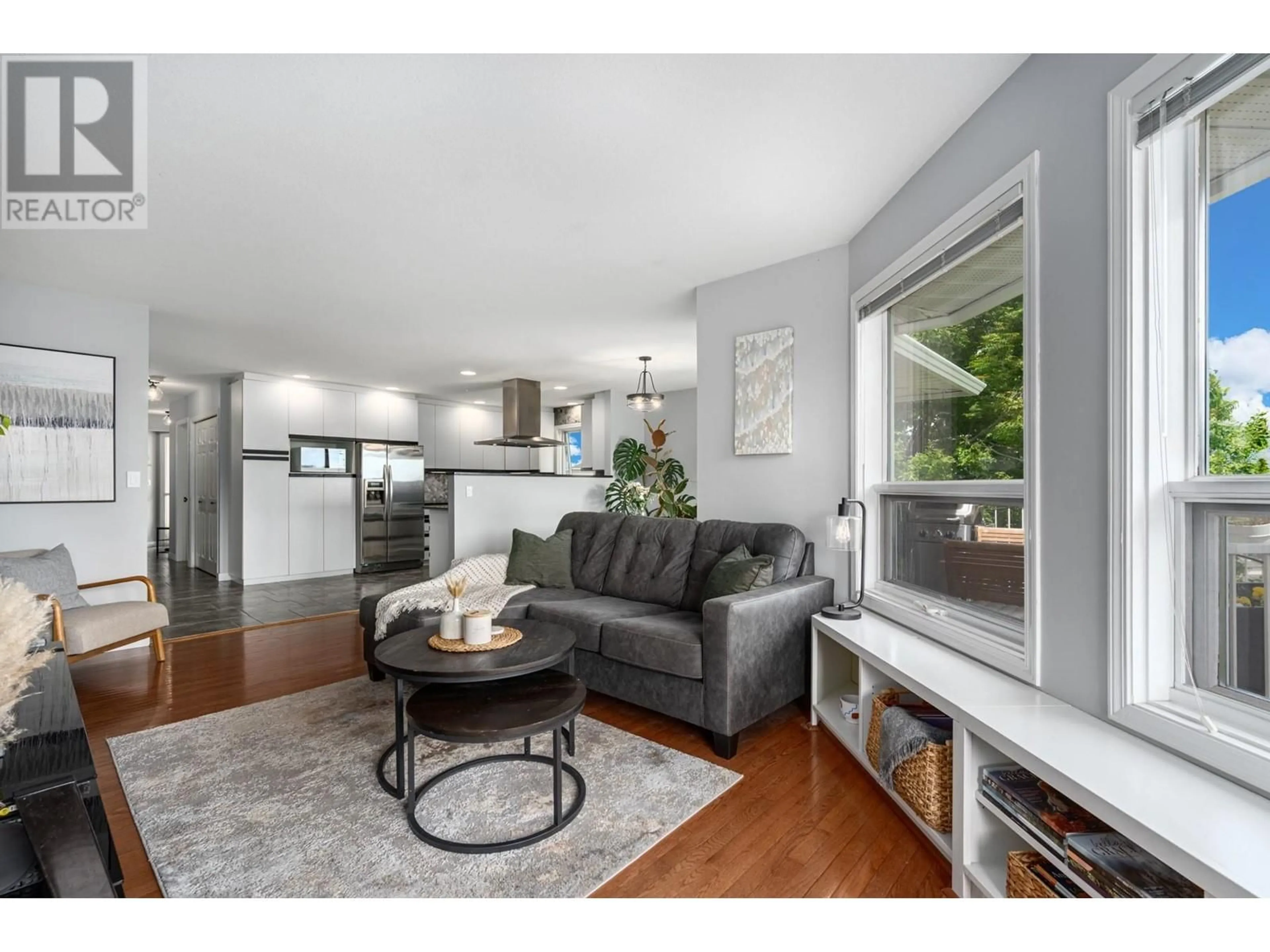 Living room with furniture, wood/laminate floor for 8 - 1775 MCKINLEY COURT, Kamloops British Columbia V2E2P2