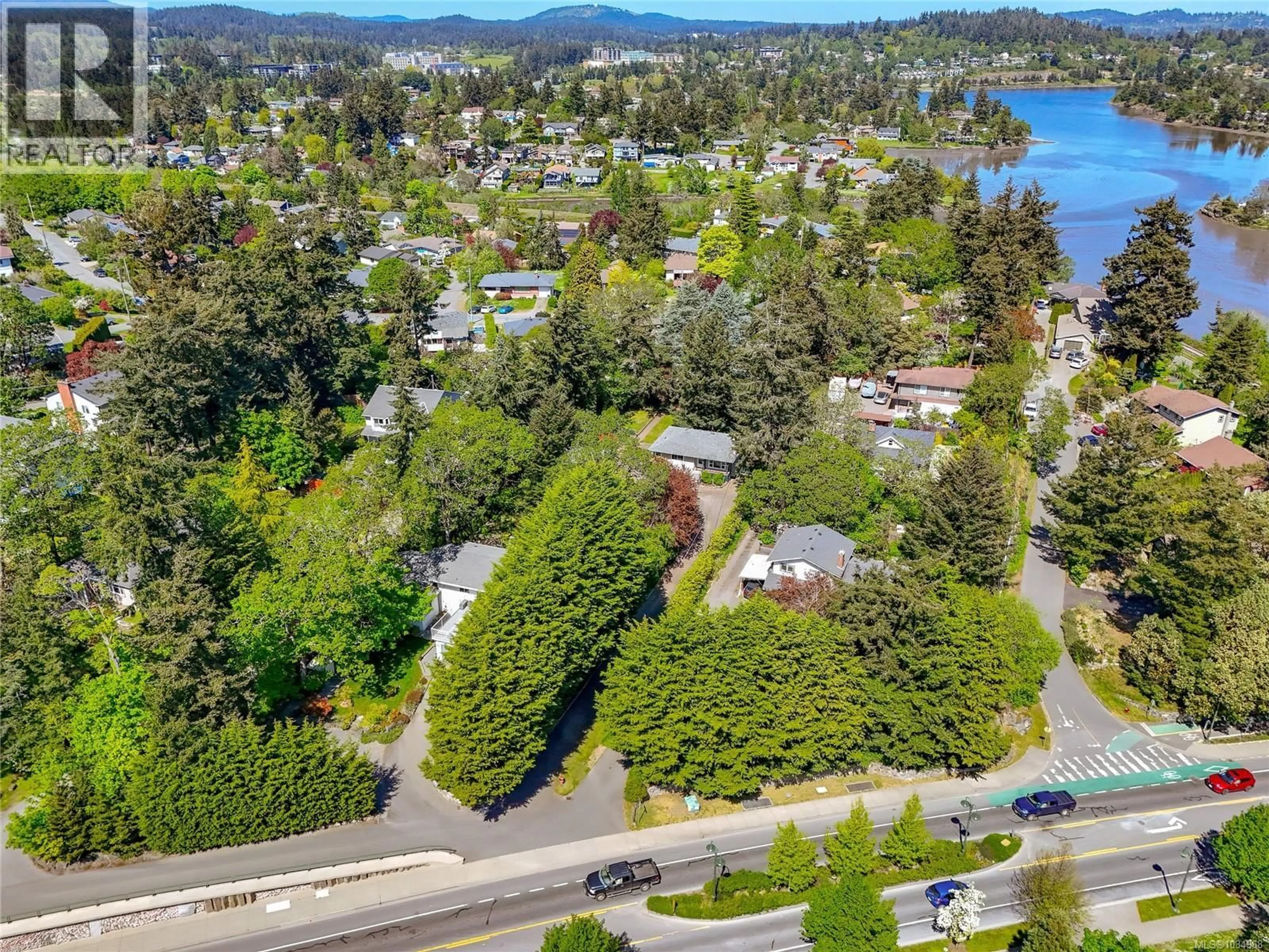 A pic from outside/outdoor area/front of a property/back of a property/a pic from drone, water/lake/river/ocean view for 164 ISLAND HIGHWAY, View Royal British Columbia V9B1G2