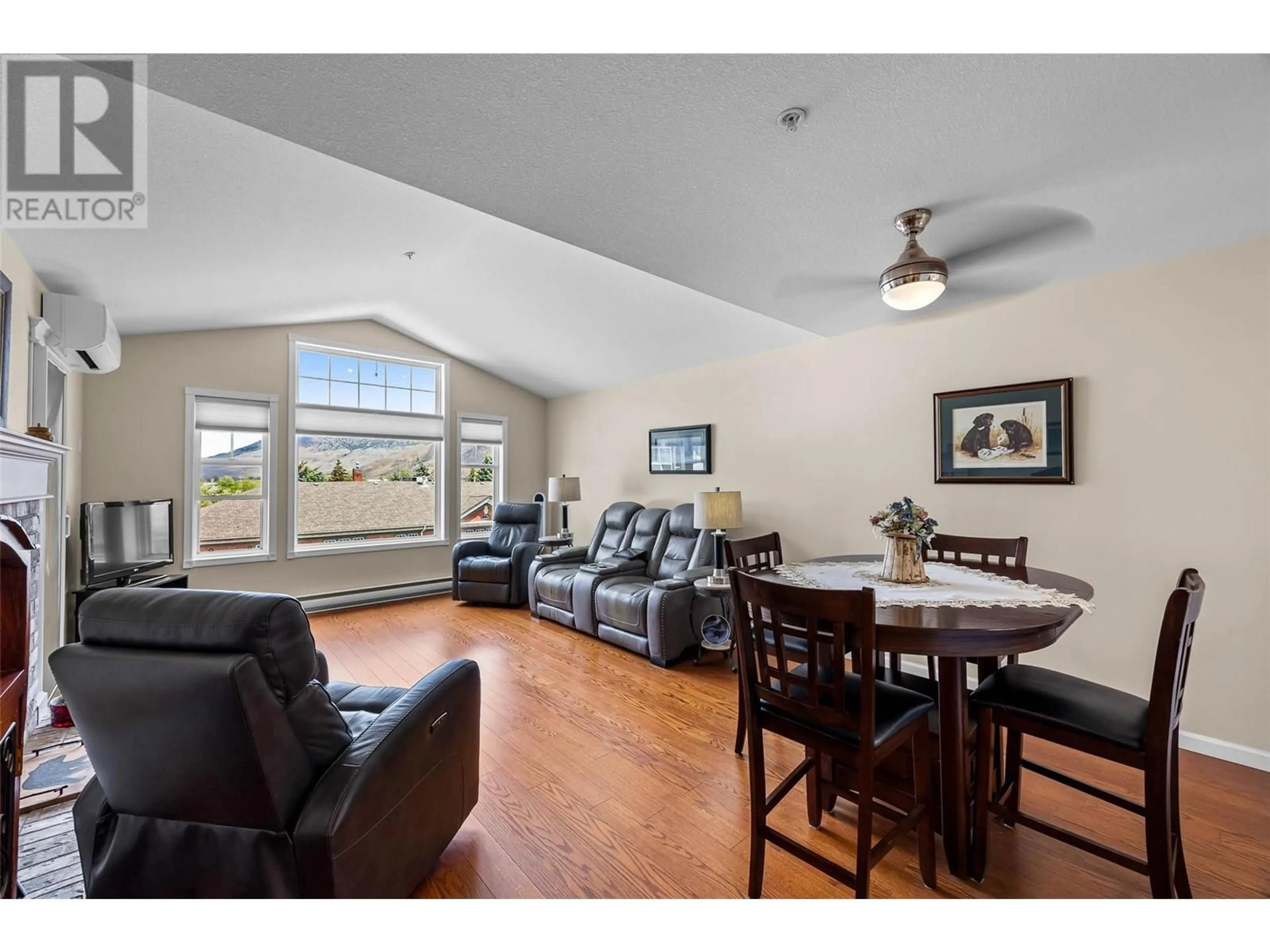Living room with furniture, wood/laminate floor for 304 - 490 LORNE STREET, Kamloops British Columbia V2C1W3