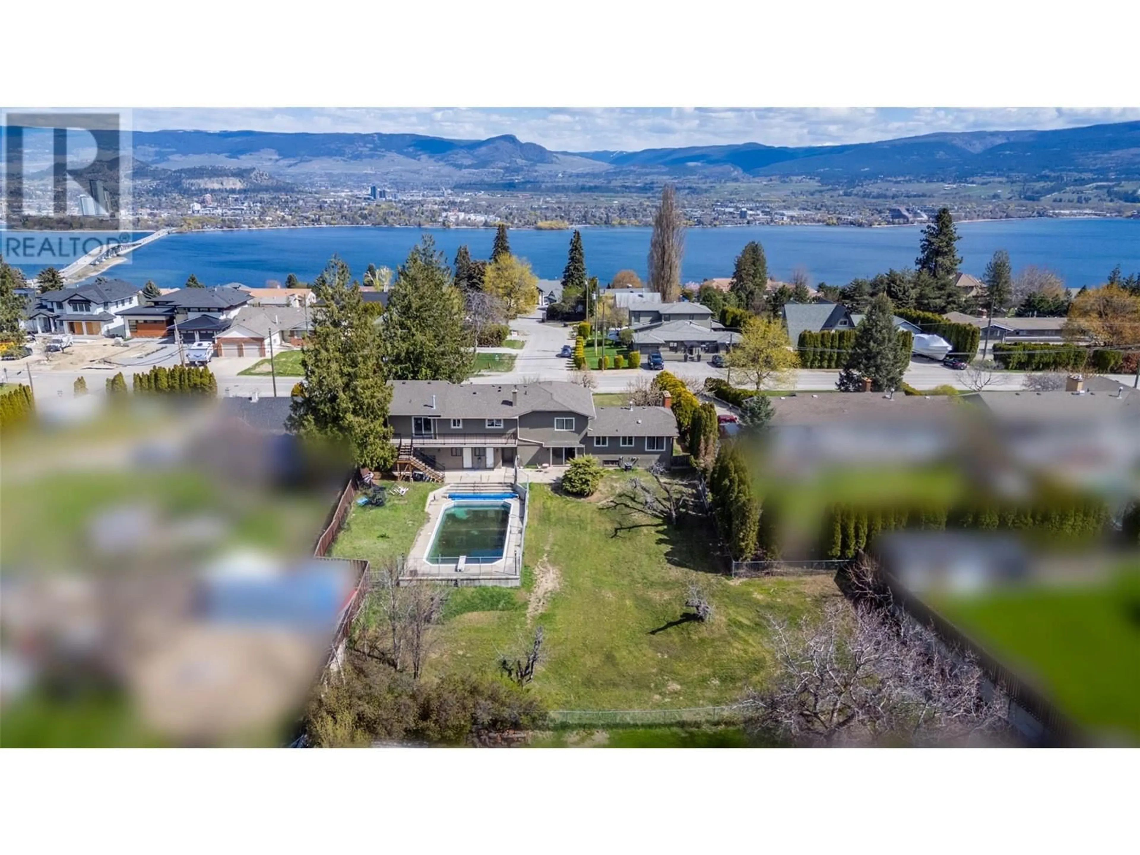 A pic from outside/outdoor area/front of a property/back of a property/a pic from drone, water/lake/river/ocean view for 2308 THACKER DRIVE, West Kelowna British Columbia V1Z1V7