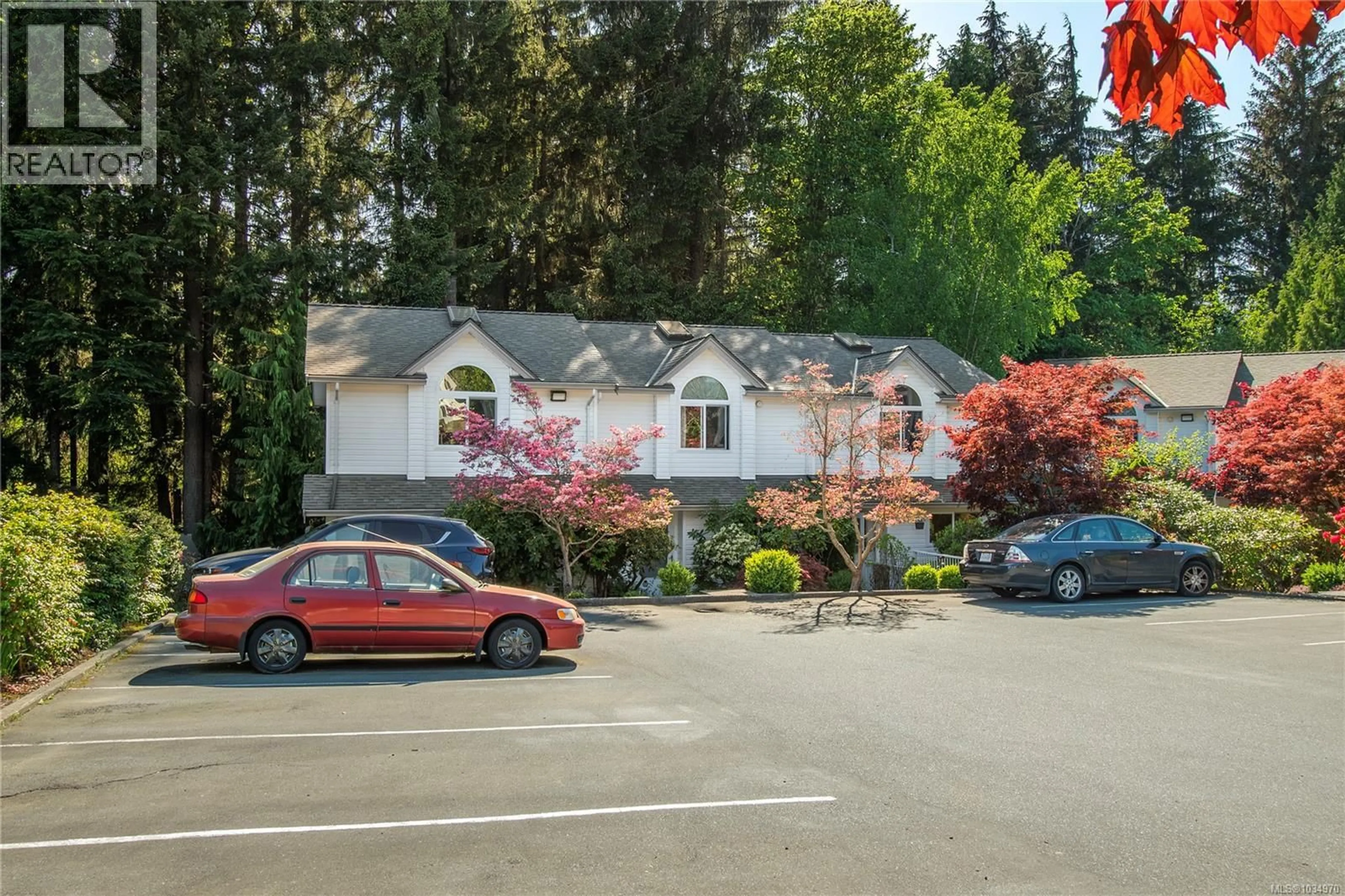 A pic from outside/outdoor area/front of a property/back of a property/a pic from drone, street for 3 - 1320 CREEKSIDE WAY, Campbell River British Columbia V9W8A9