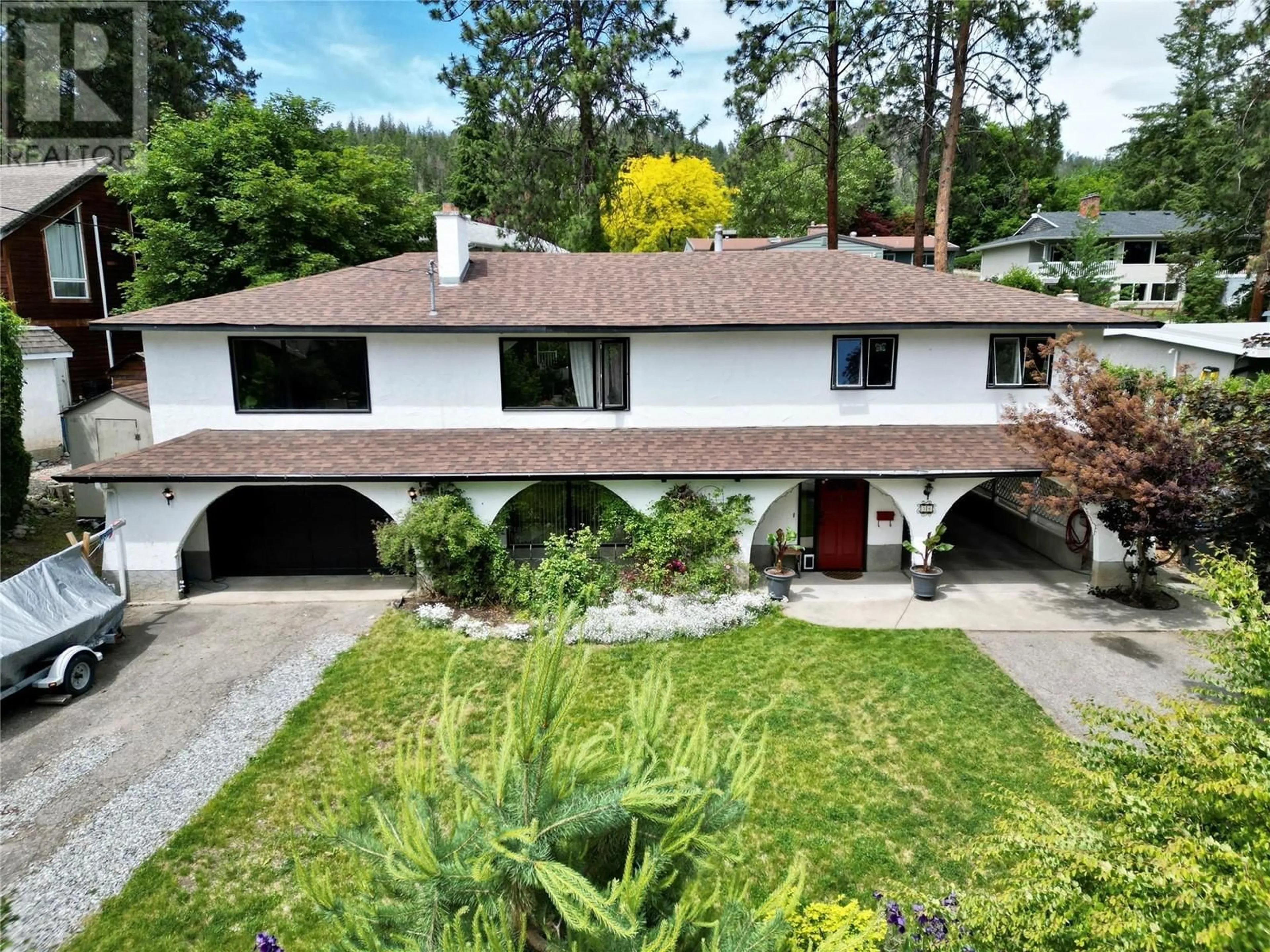 A pic from outside/outdoor area/front of a property/back of a property/a pic from drone, unknown for 36 CARAMILLO ROAD, Kelowna British Columbia V1V1B3