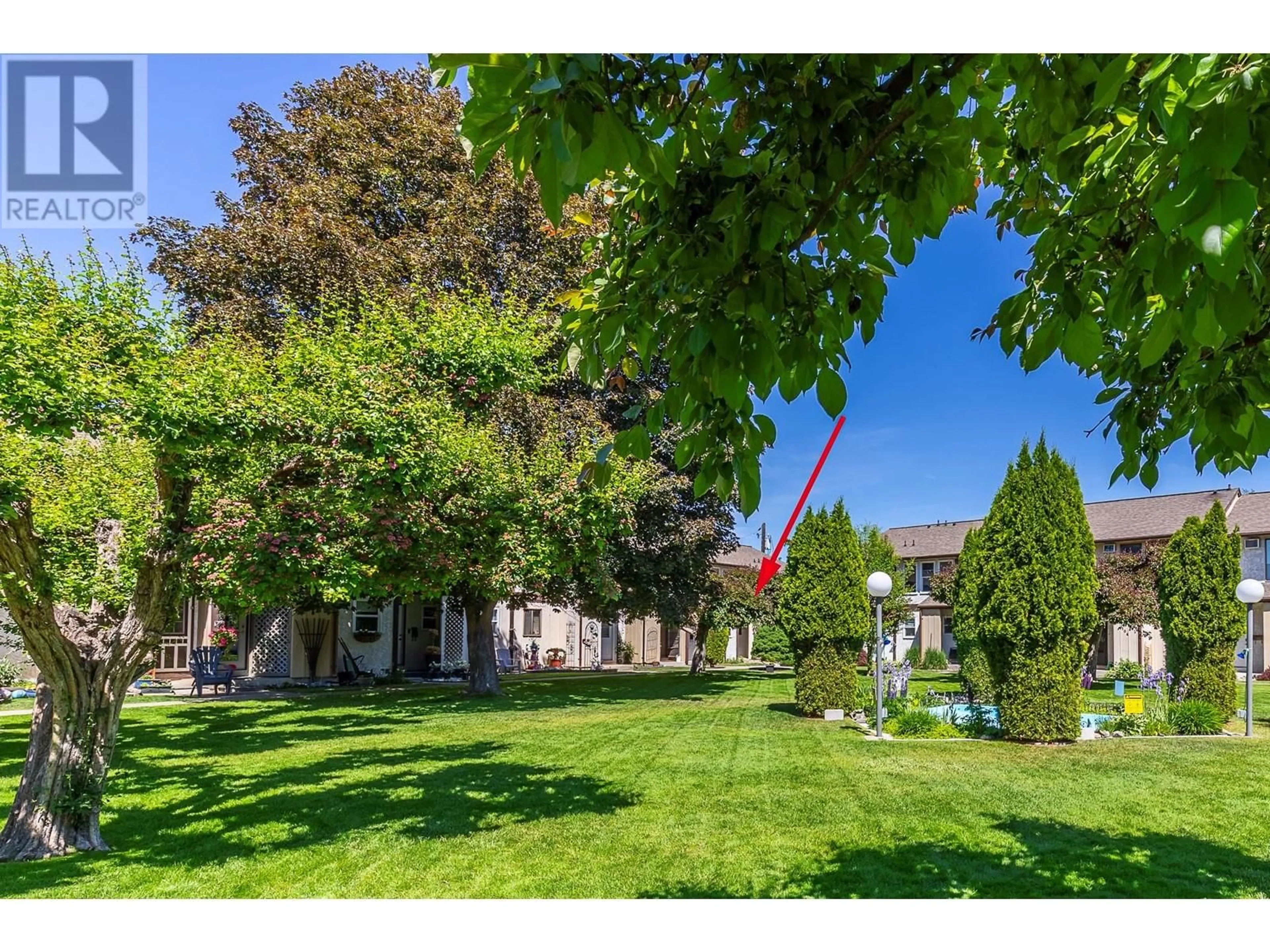 A pic from outside/outdoor area/front of a property/back of a property/a pic from drone, street for 133 - 4100 24 AVENUE, Vernon British Columbia V1T1M2