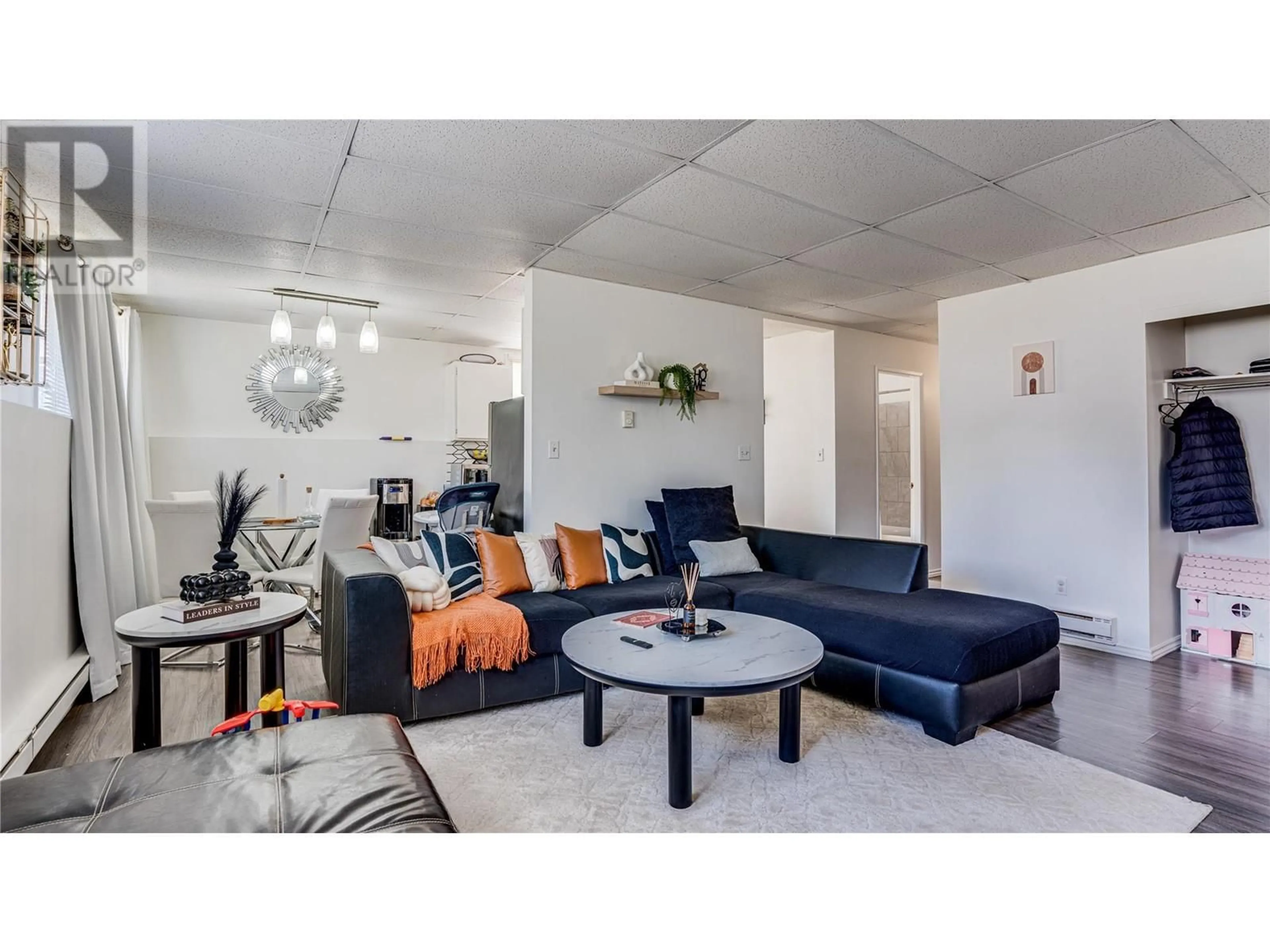 Living room with furniture, unknown for 1604 45 STREET, Vernon British Columbia V1T7P8