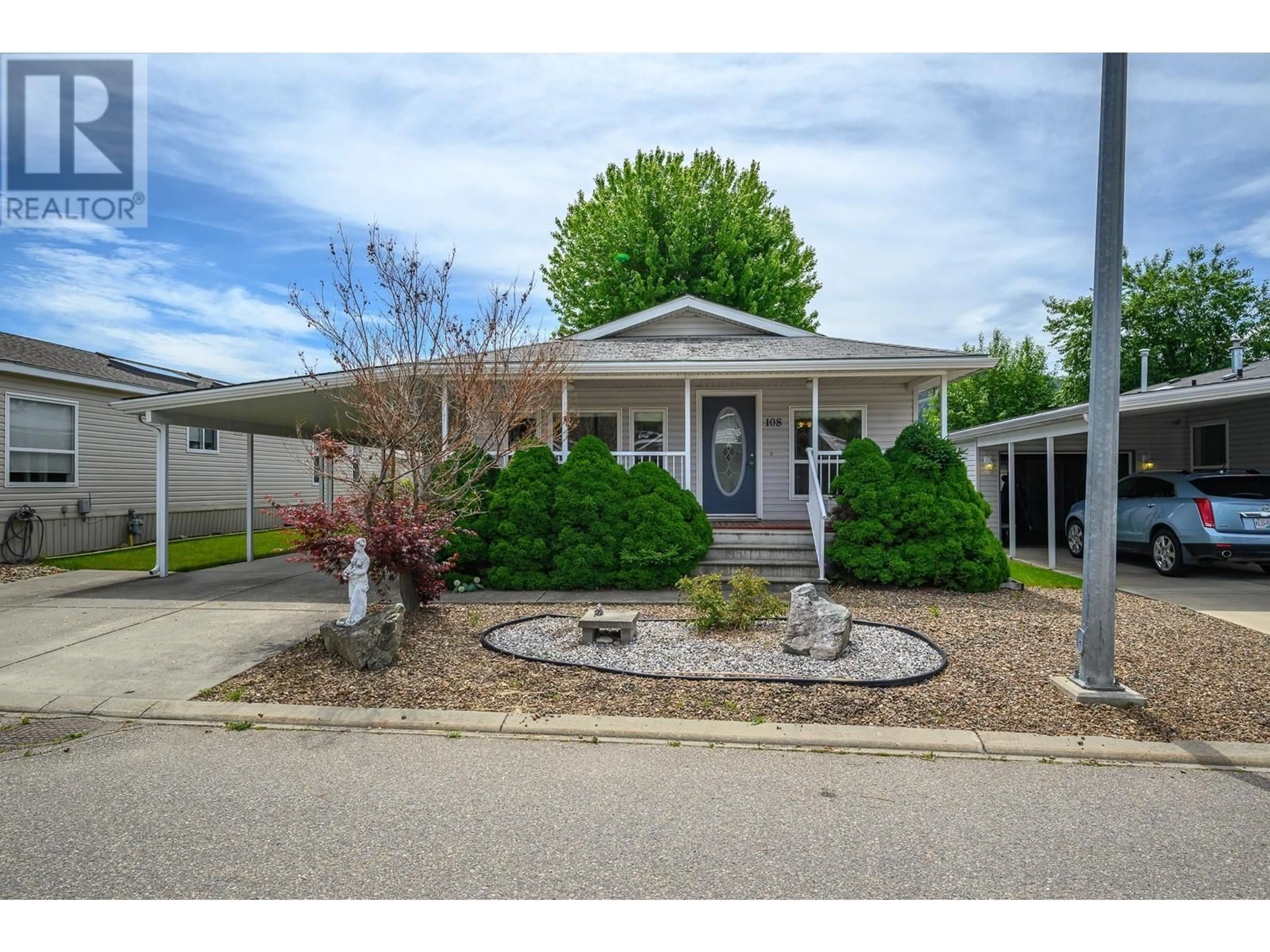 Home with vinyl exterior material, street for 108 - 6688 TRONSON ROAD, Vernon British Columbia V1H1R9