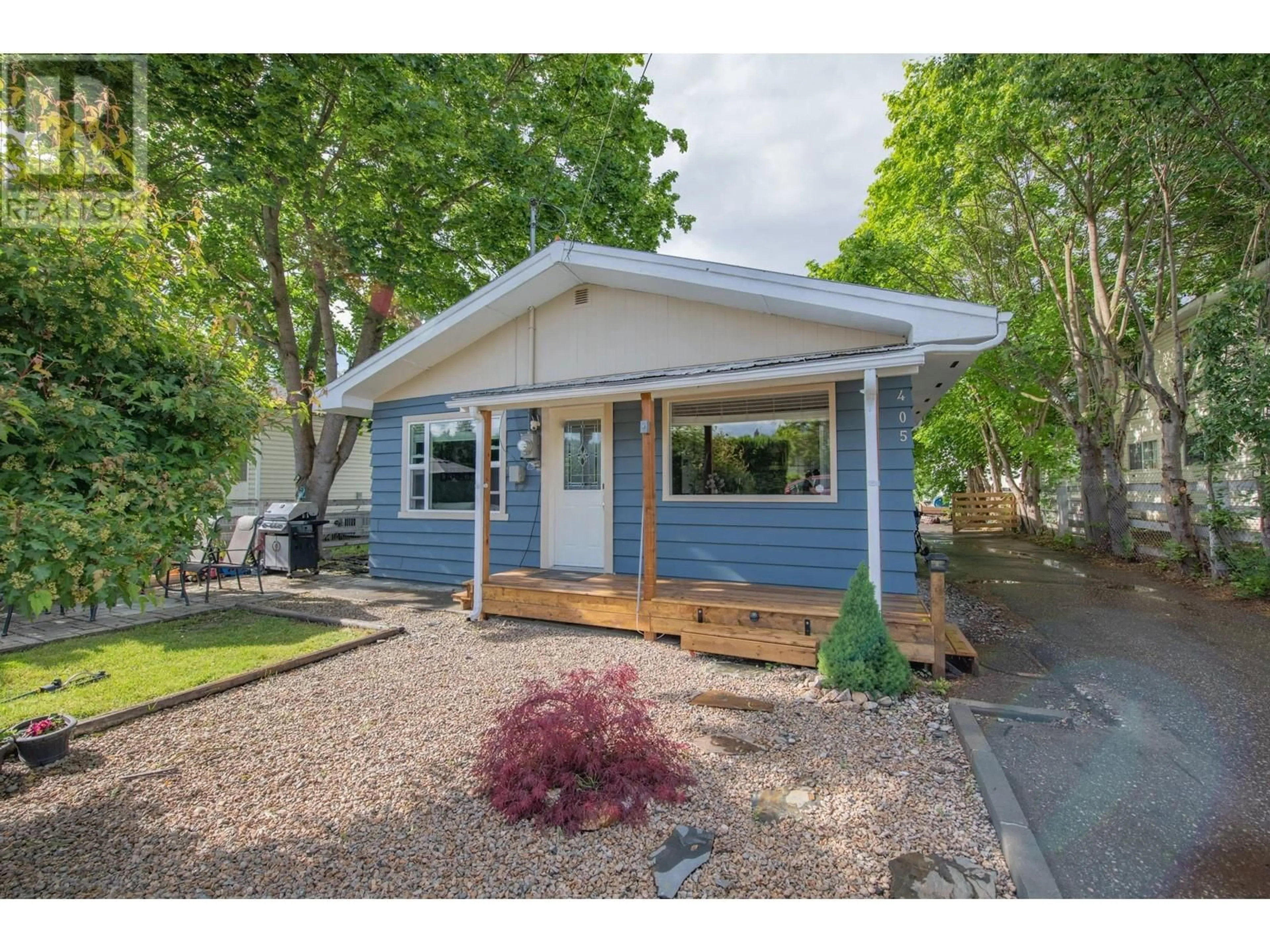 Home with vinyl exterior material, street for 405 BAIRD AVENUE, Enderby British Columbia V0E1V2