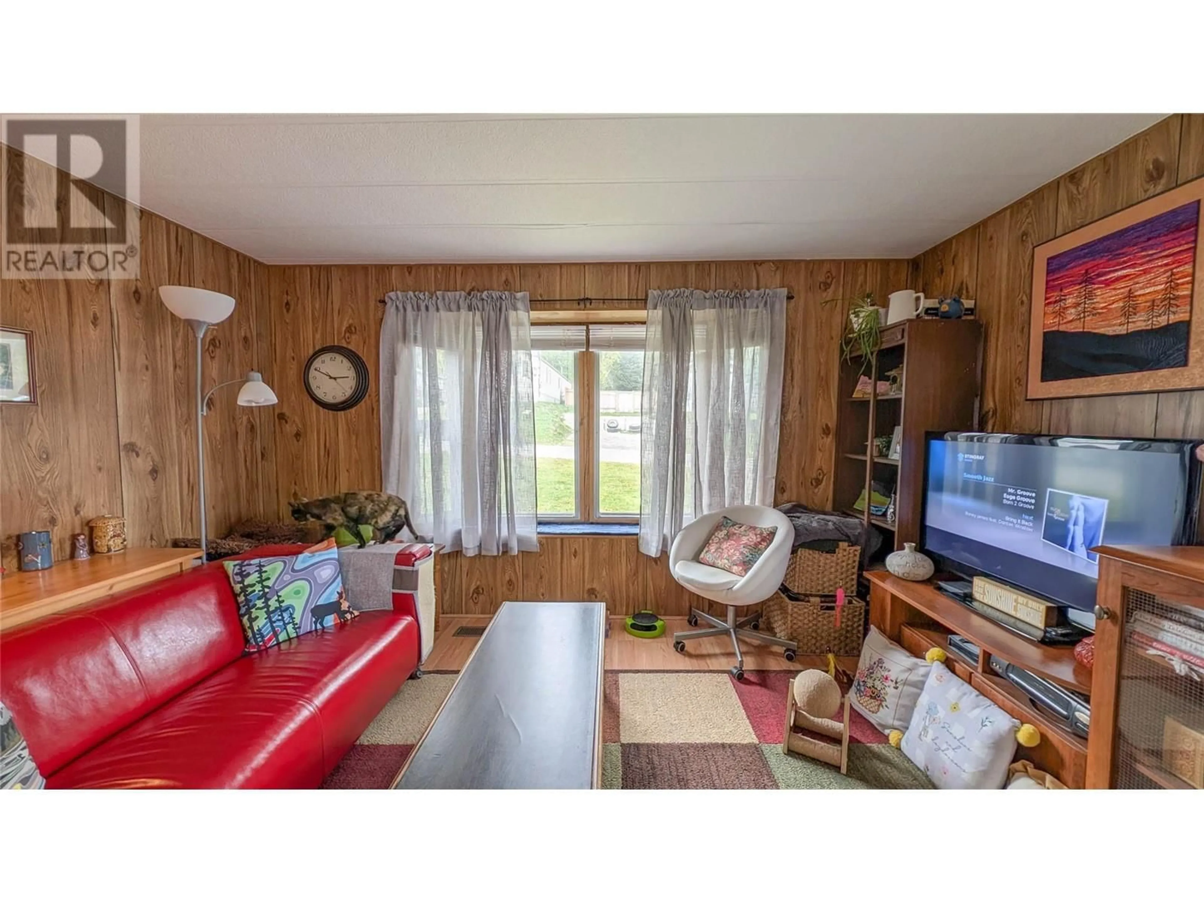 Living room with furniture, wood/laminate floor for 415 BICKFORD DRIVE, Elkford British Columbia V0B1H0