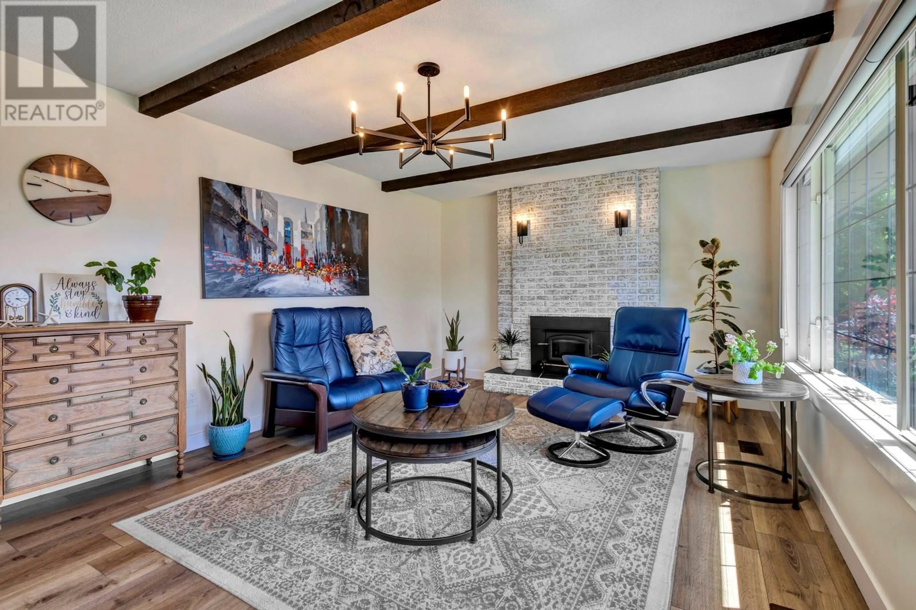 Living room with furniture, ceramic/tile floor for 1123 PINECREST LANE, Kelowna British Columbia V1Y4L4
