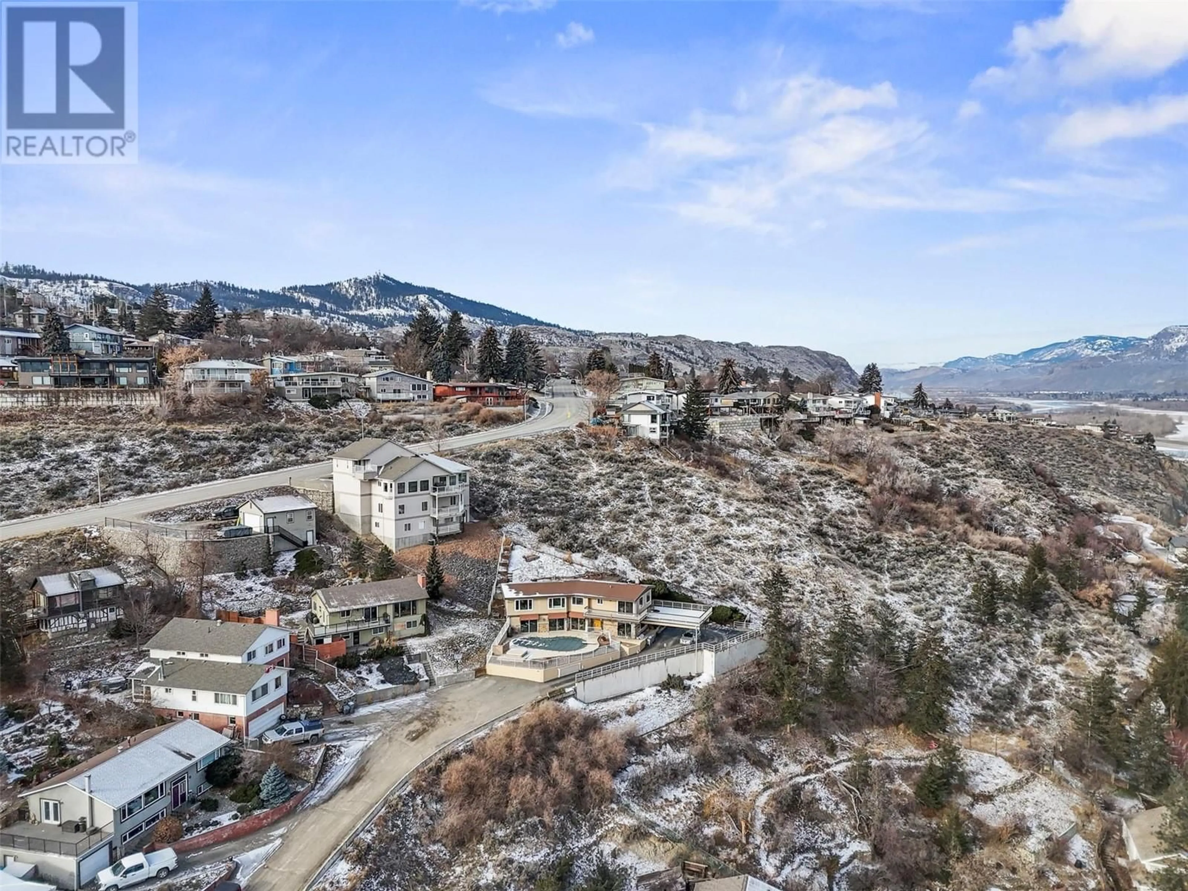 A pic from outside/outdoor area/front of a property/back of a property/a pic from drone, mountain view for 287 CONNAUGHT ROAD, Kamloops British Columbia V2C1G5