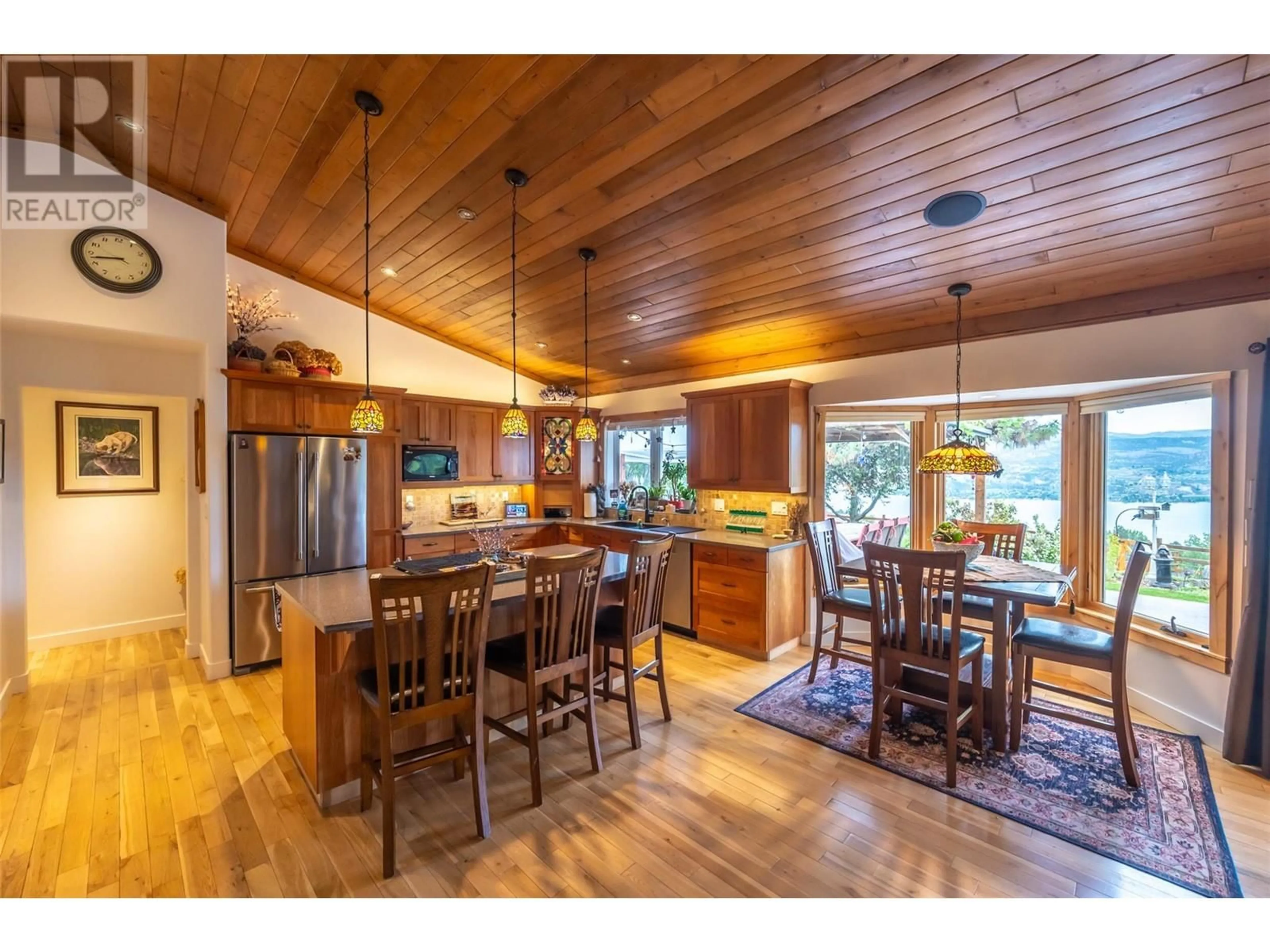Open concept kitchen, wood/laminate floor for 2839 ARAWANA PLACE, Naramata British Columbia V0H1N1
