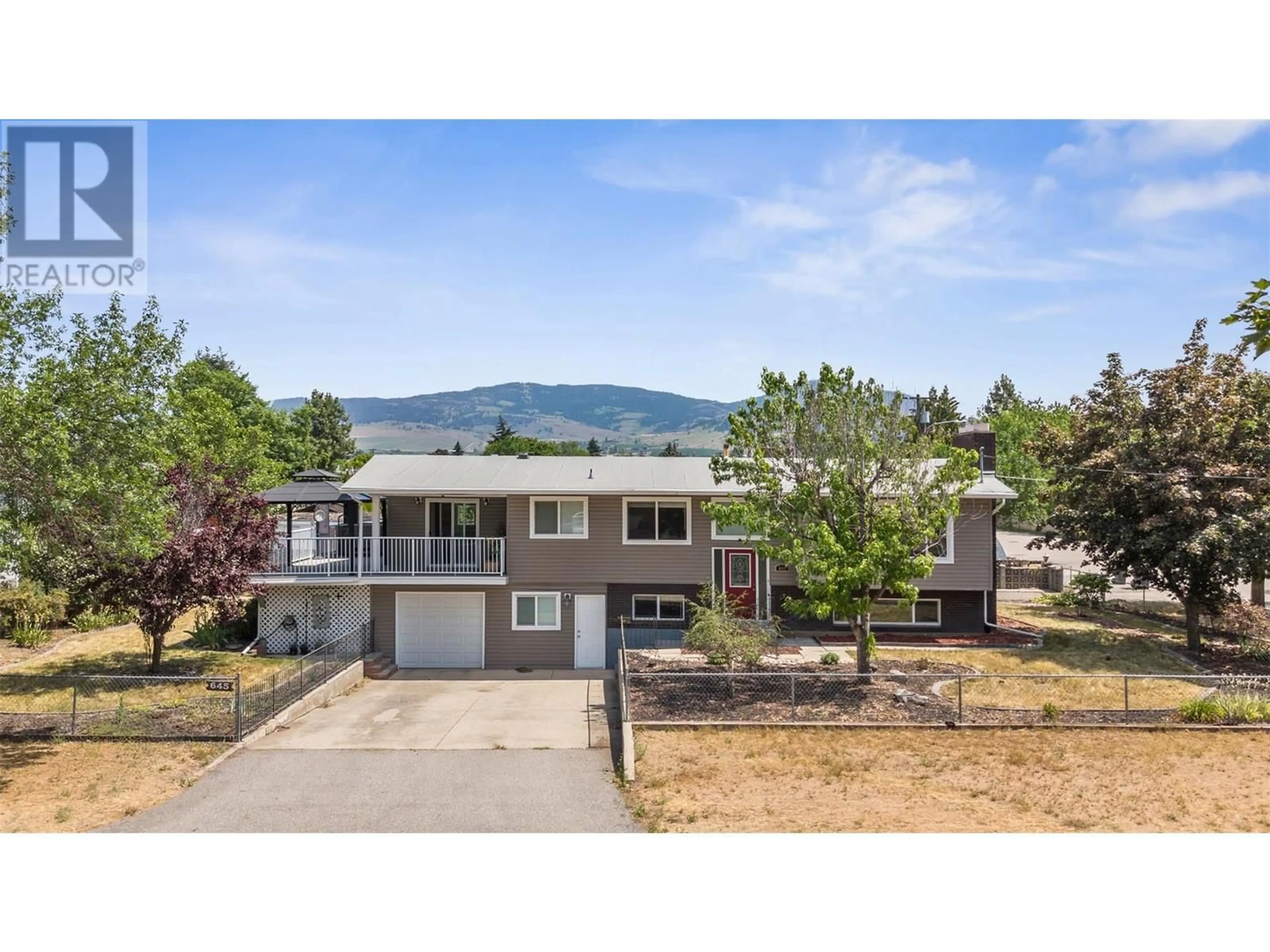 A pic from outside/outdoor area/front of a property/back of a property/a pic from drone, mountain view for 645 MARK ROAD, Kelowna British Columbia V1X5G8