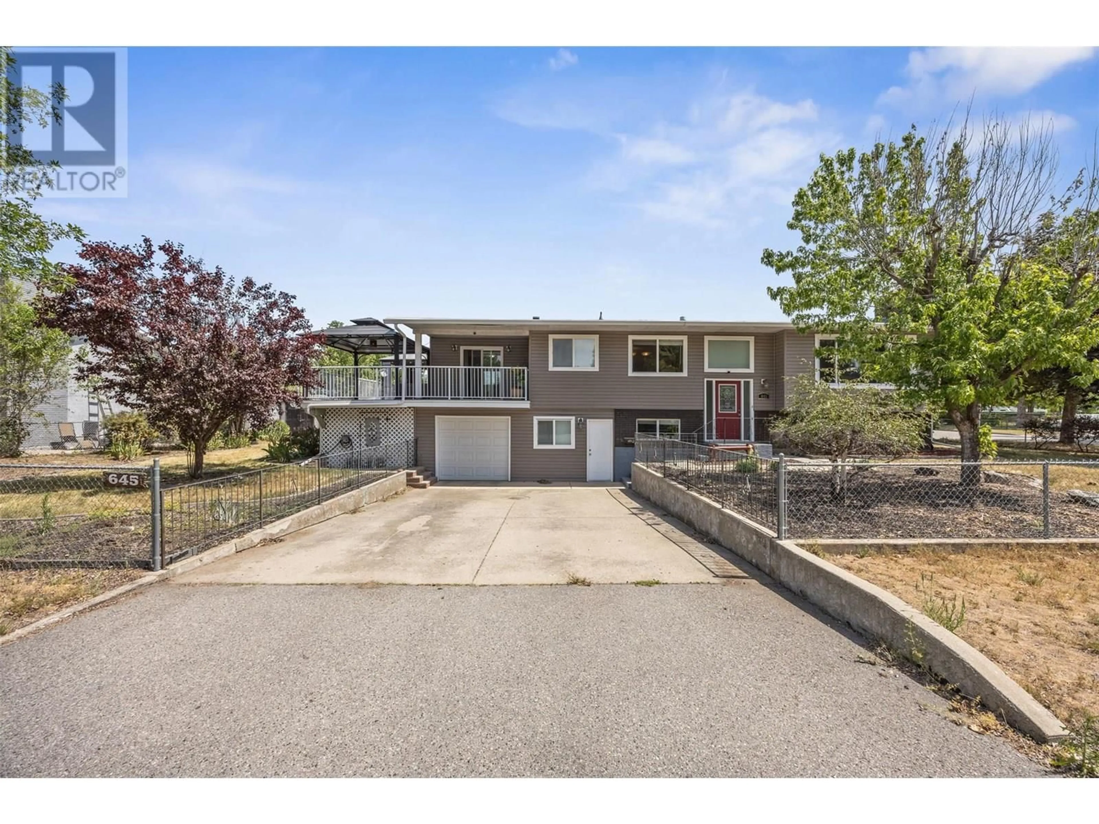 A pic from outside/outdoor area/front of a property/back of a property/a pic from drone, street for 645 MARK ROAD, Kelowna British Columbia V1X5G8