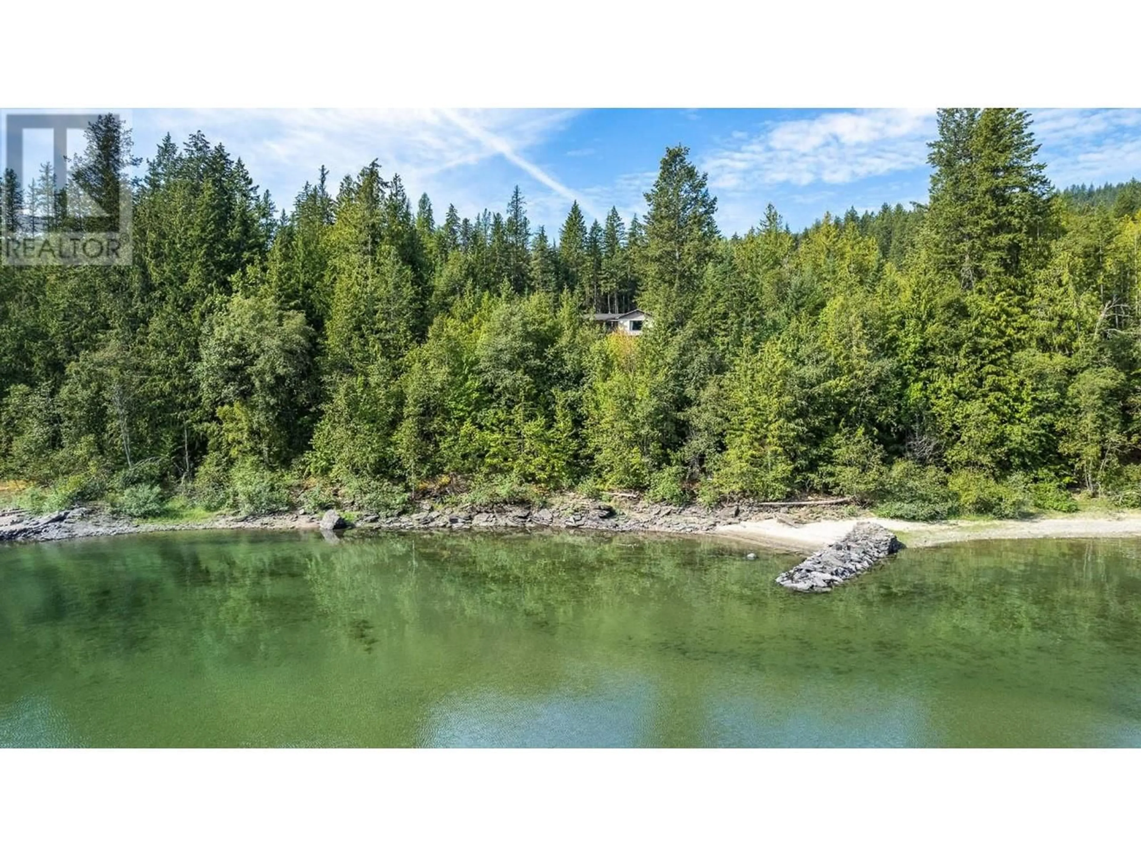 A pic from outside/outdoor area/front of a property/back of a property/a pic from drone, water/lake/river/ocean view for 15730 PETERS ROAD, Crawford Bay British Columbia V0B1E0