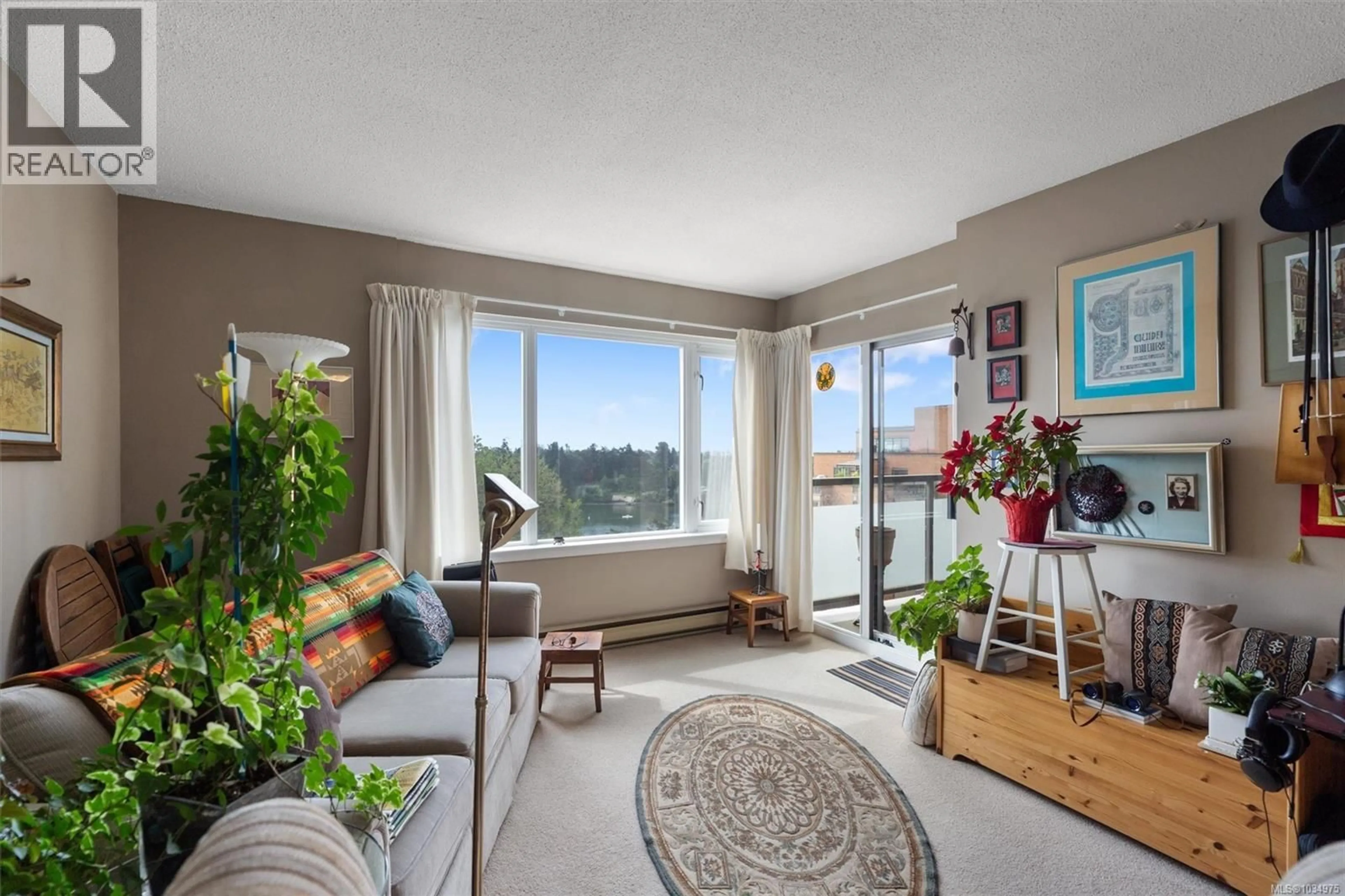 Living room with furniture, unknown for 703 - 103 GORGE ROAD EAST, Victoria British Columbia V9A6Z2