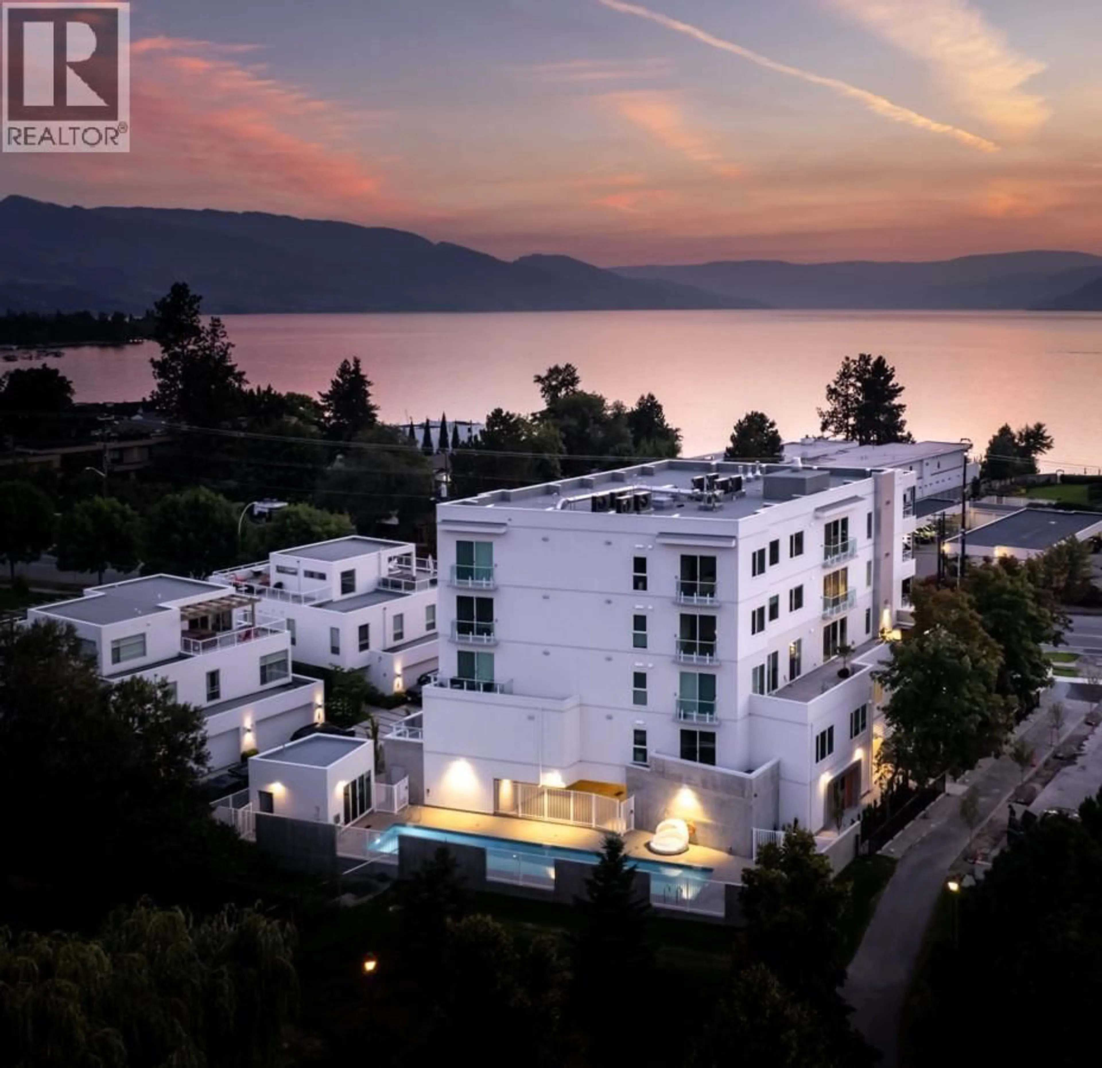 A pic from outside/outdoor area/front of a property/back of a property/a pic from drone, water/lake/river/ocean view for 201 - 4071 LAKESHORE ROAD, Kelowna British Columbia V1W1V7