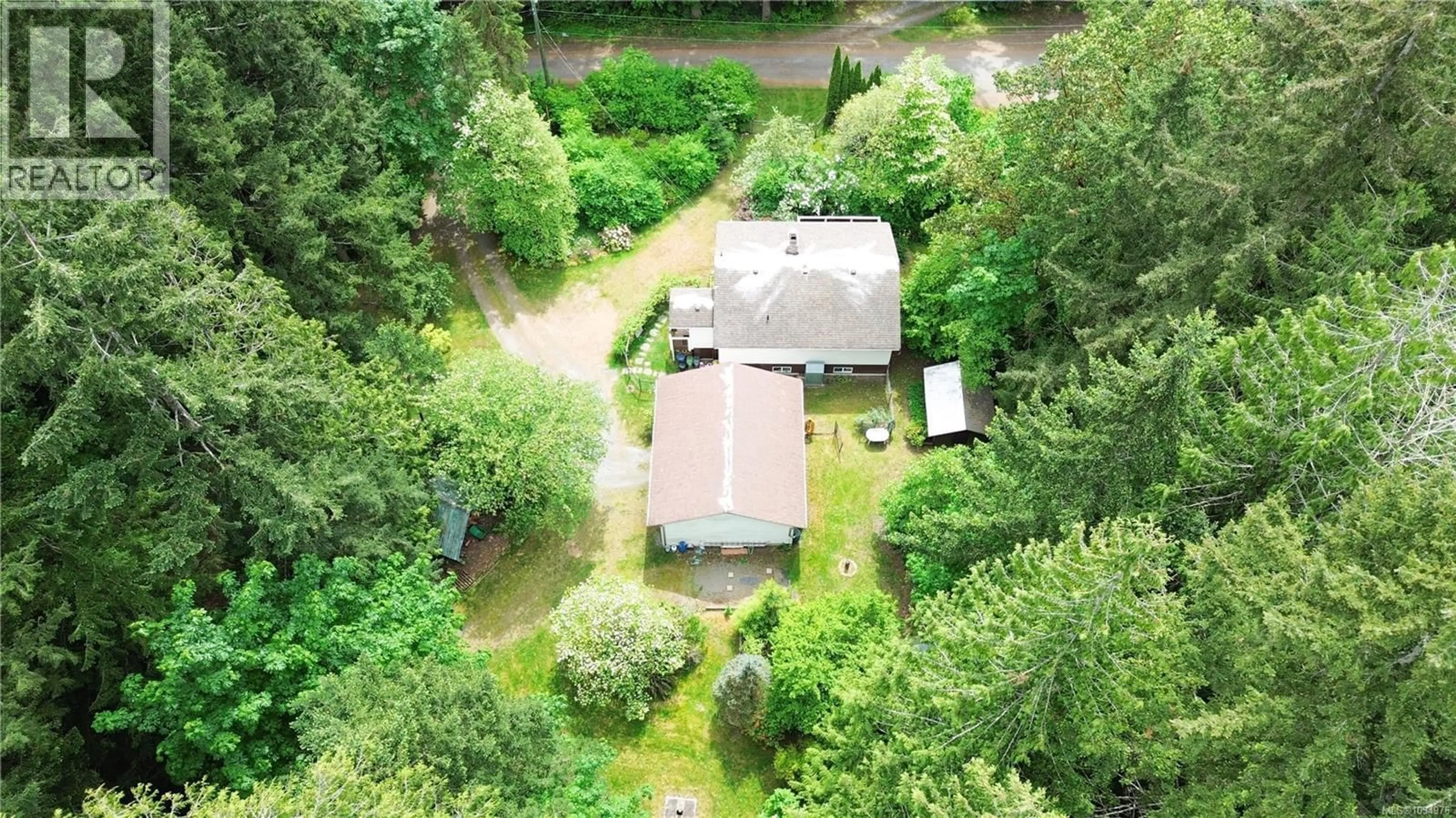 A pic from outside/outdoor area/front of a property/back of a property/a pic from drone, forest/trees view for 8647 SWEENEY ROAD, Chemainus British Columbia V0R1K4