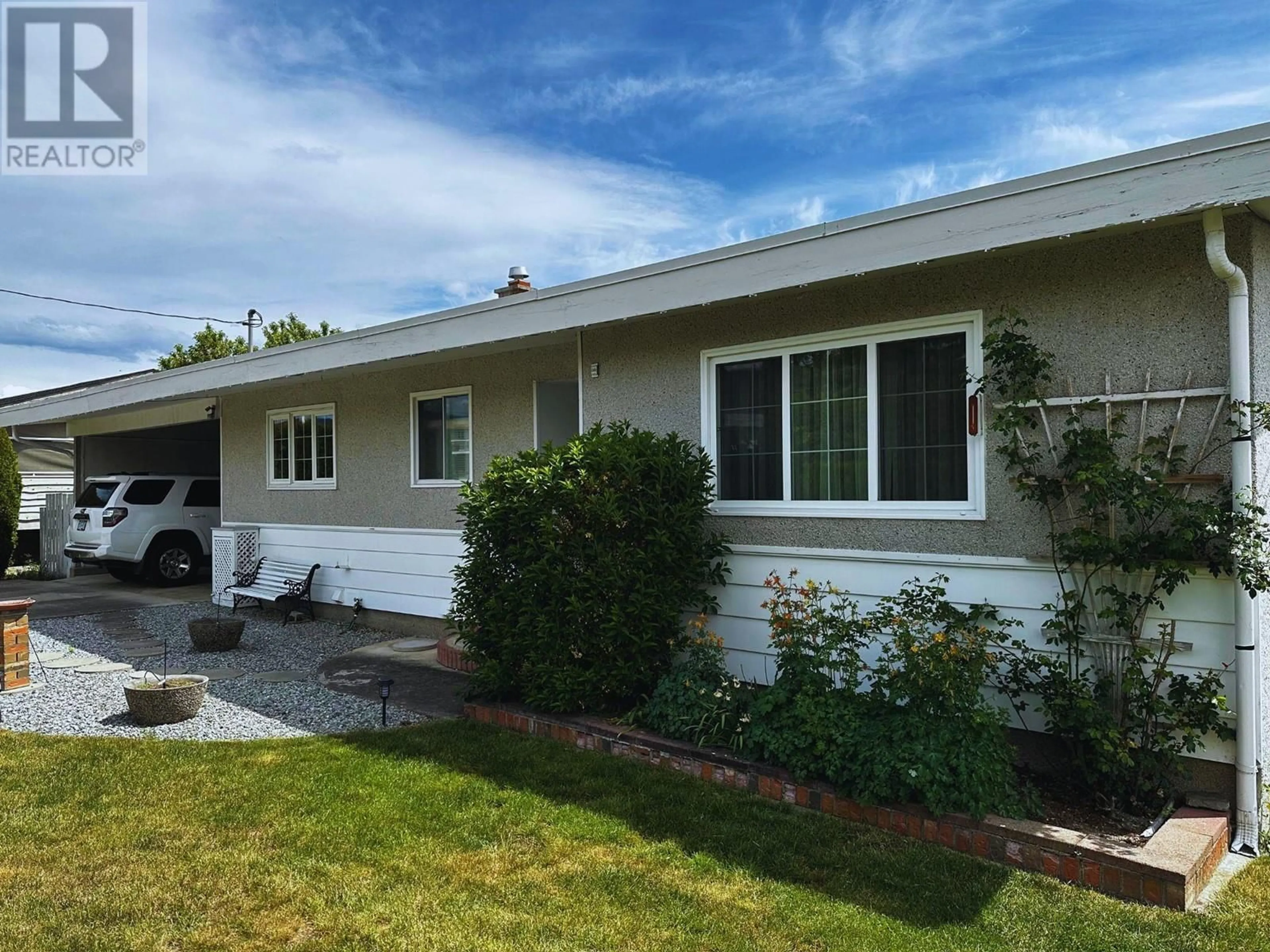 Home with vinyl exterior material, street for 2181 PETERS ROAD, West Kelowna British Columbia V4T2C3