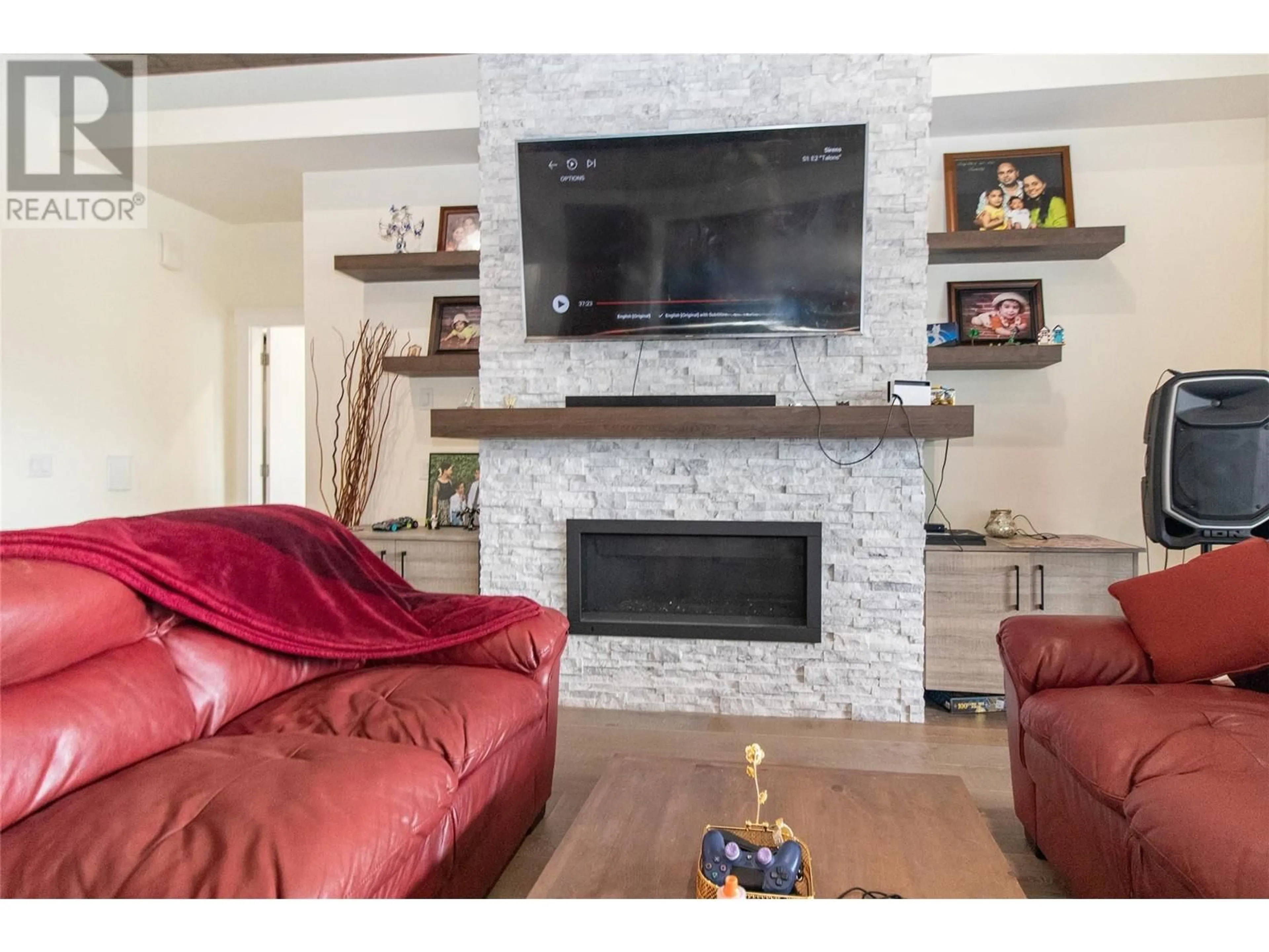 Living room with furniture, unknown for 2132 TRAMONTO COURT, Kelowna British Columbia V1P1V1
