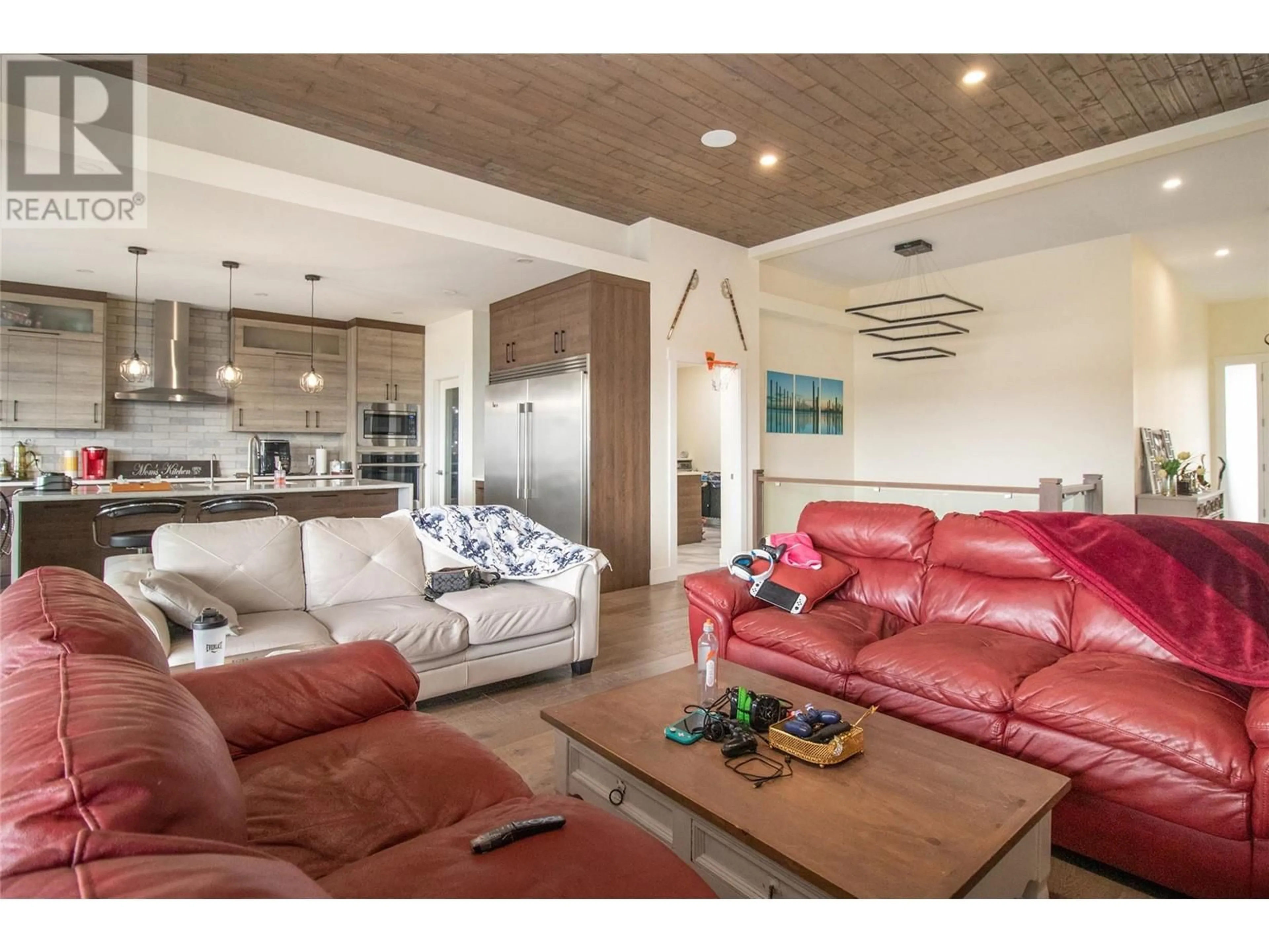 Living room with furniture, unknown for 2132 TRAMONTO COURT, Kelowna British Columbia V1P1V1