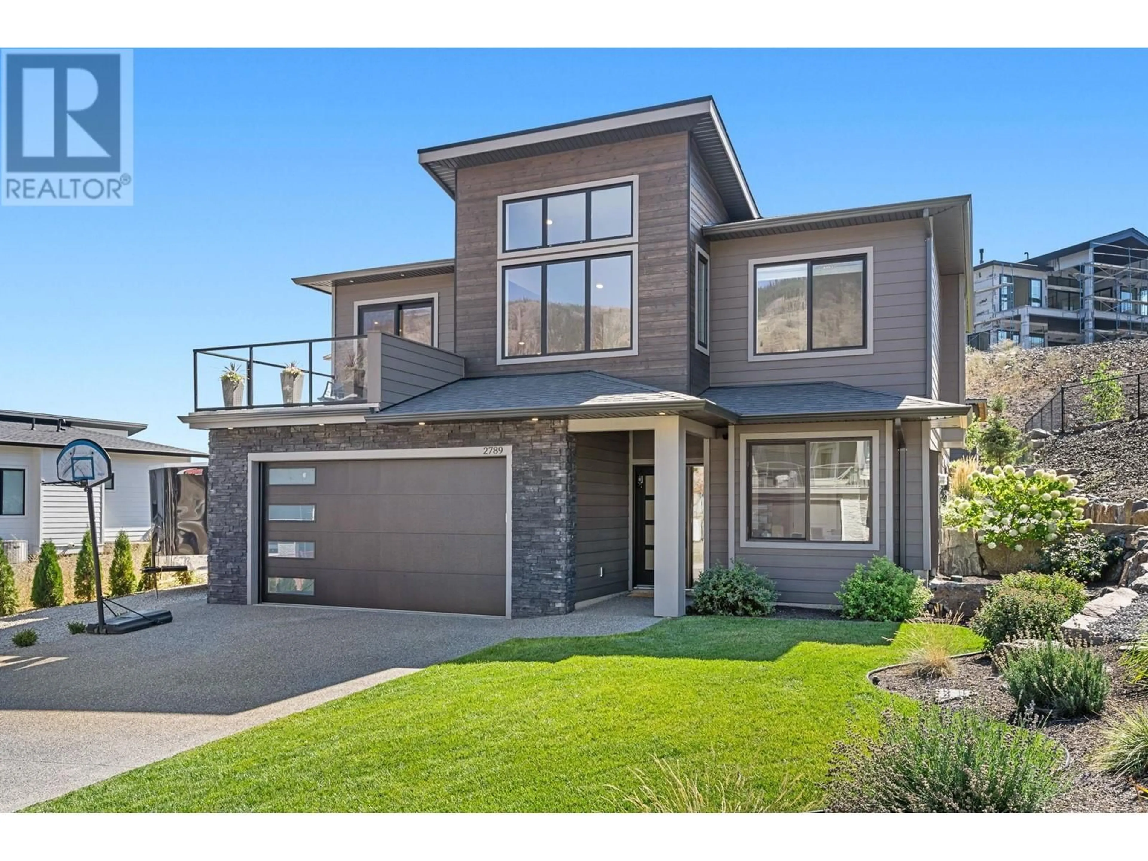Home with brick exterior material, street for 2789 CANYON CREST DRIVE, West Kelowna British Columbia V4T0E3