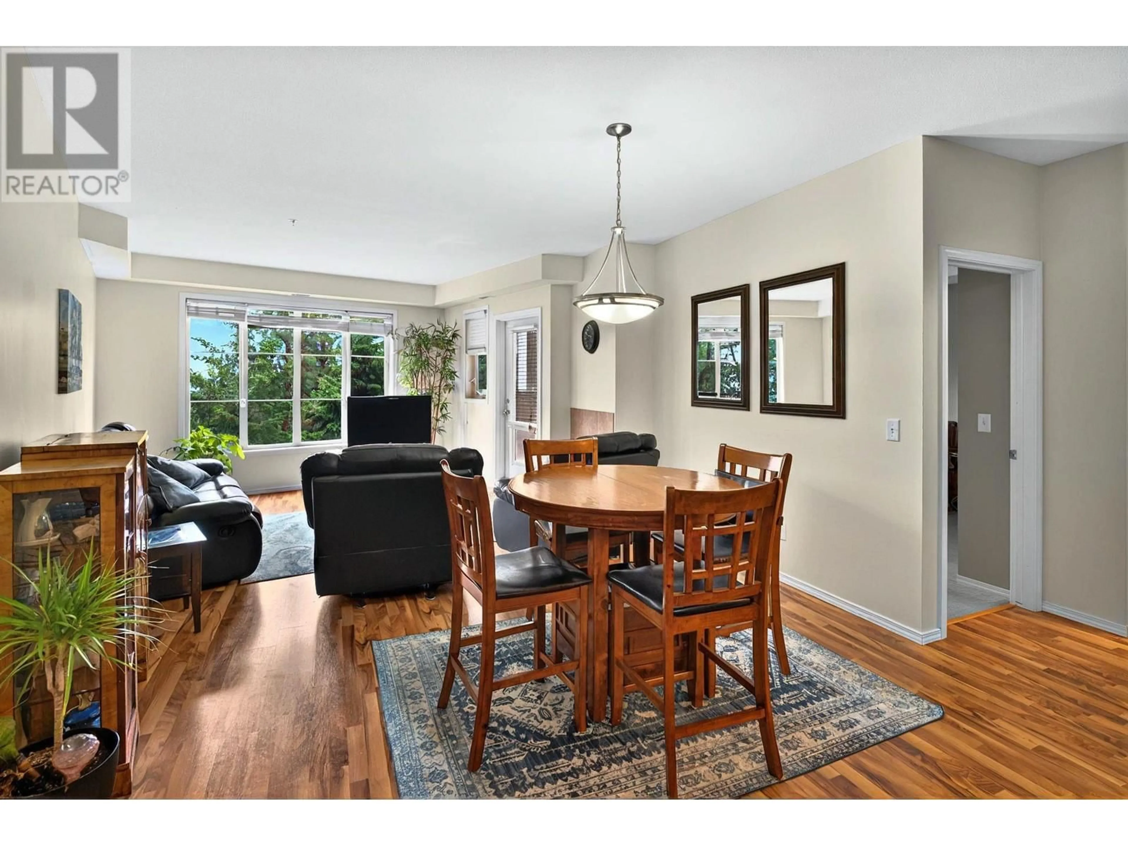 Dining room, wood/laminate floor for 2206 - 1873 COUNTRY CLUB DRIVE, Kelowna British Columbia V1V2W6