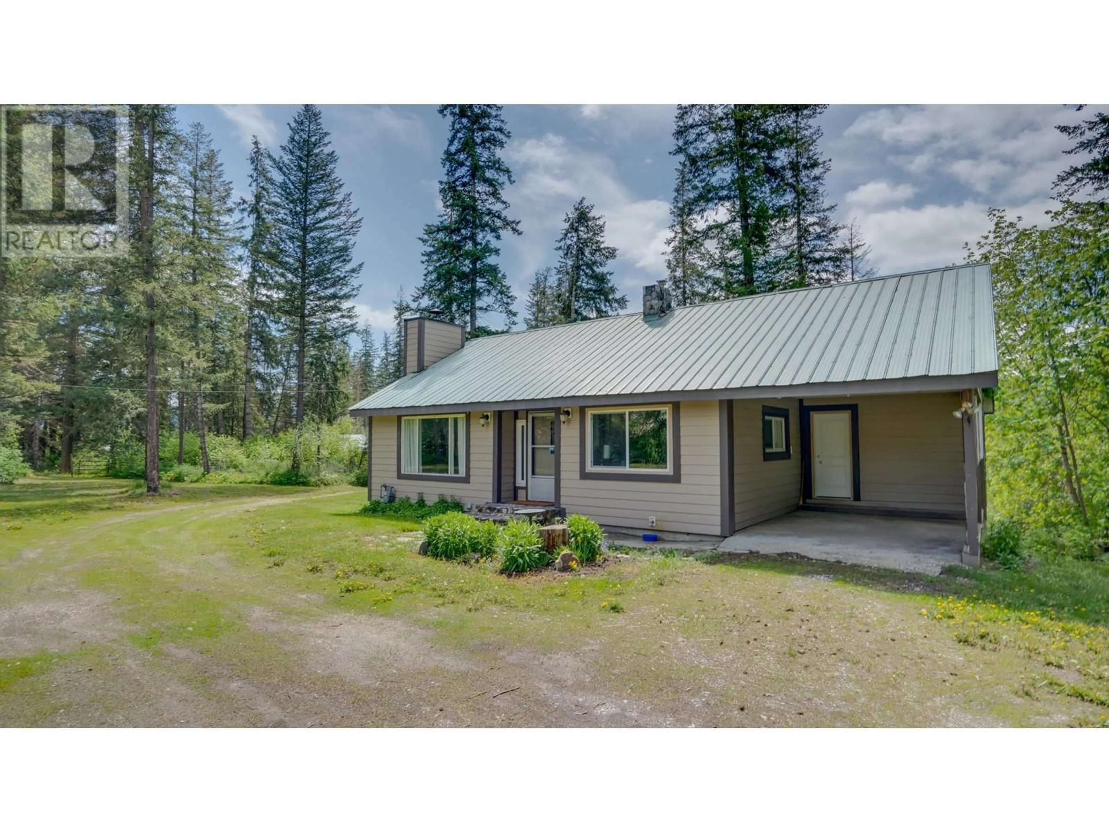 A pic from outside/outdoor area/front of a property/back of a property/a pic from drone, unknown for 11 GARDOM LAKE ROAD, Enderby British Columbia V0E1V2