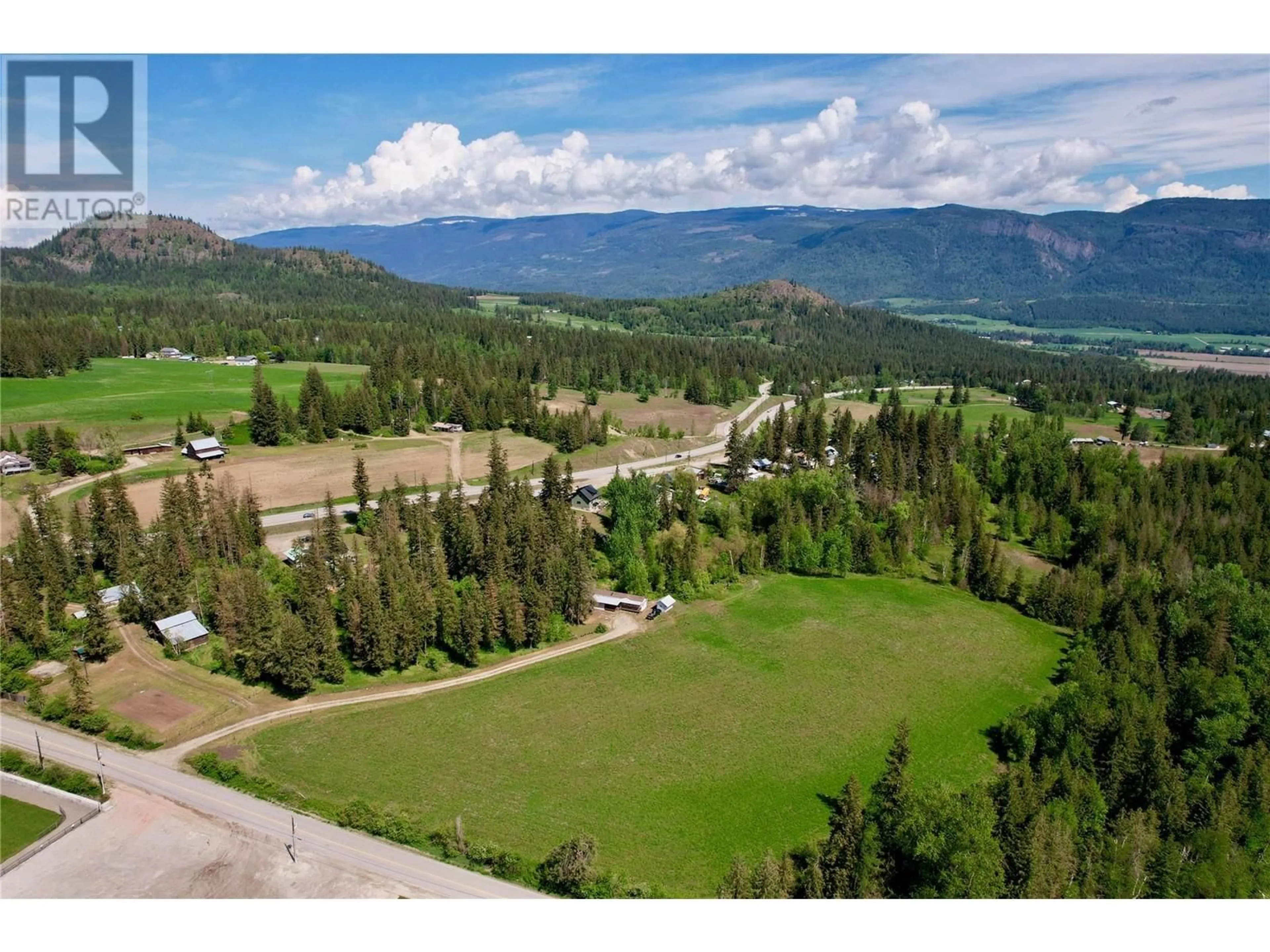 A pic from outside/outdoor area/front of a property/back of a property/a pic from drone, mountain view for 11 GARDOM LAKE ROAD, Enderby British Columbia V0E1V2