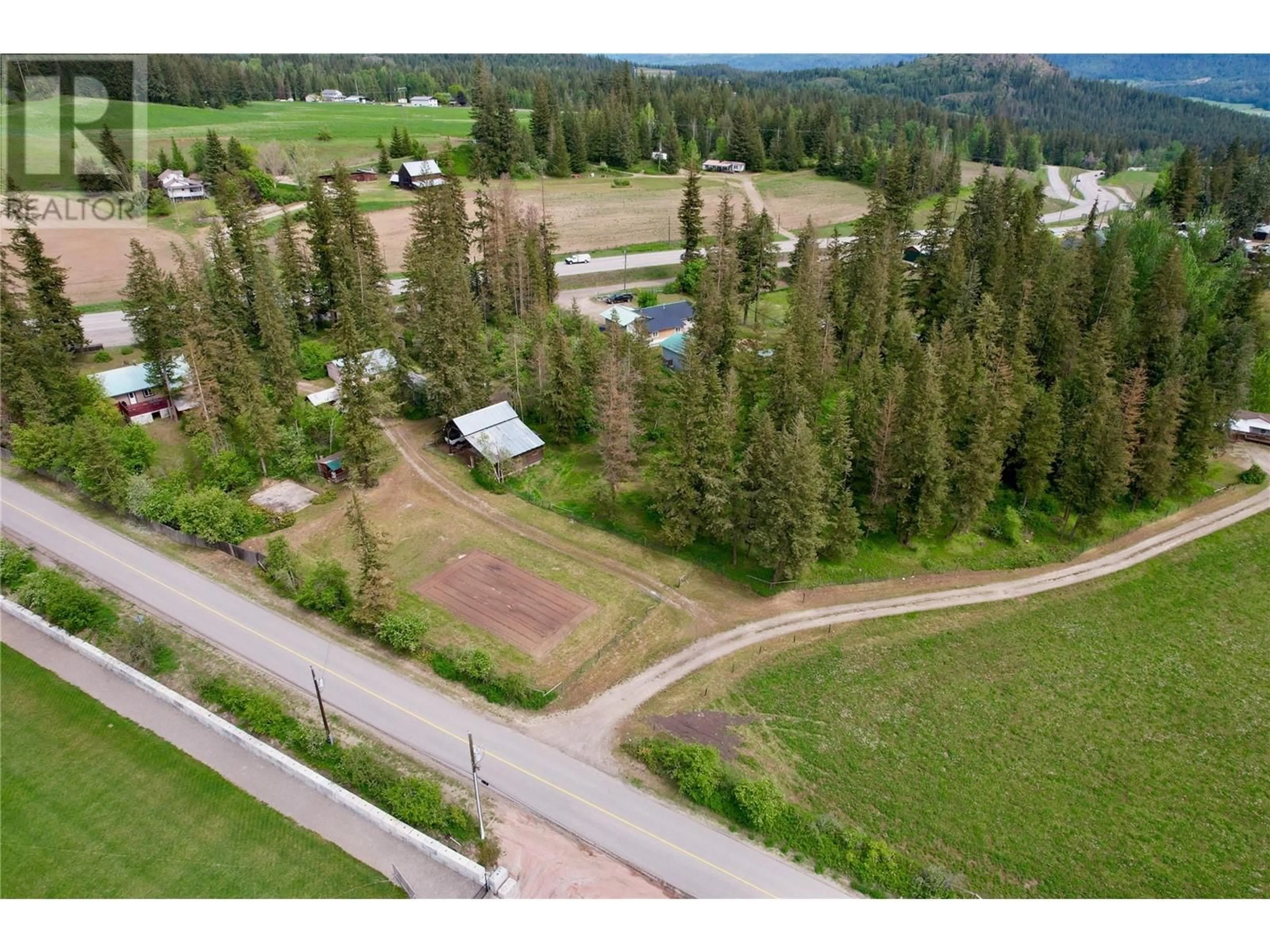 A pic from outside/outdoor area/front of a property/back of a property/a pic from drone, mountain view for 11 GARDOM LAKE ROAD, Enderby British Columbia V0E1V2