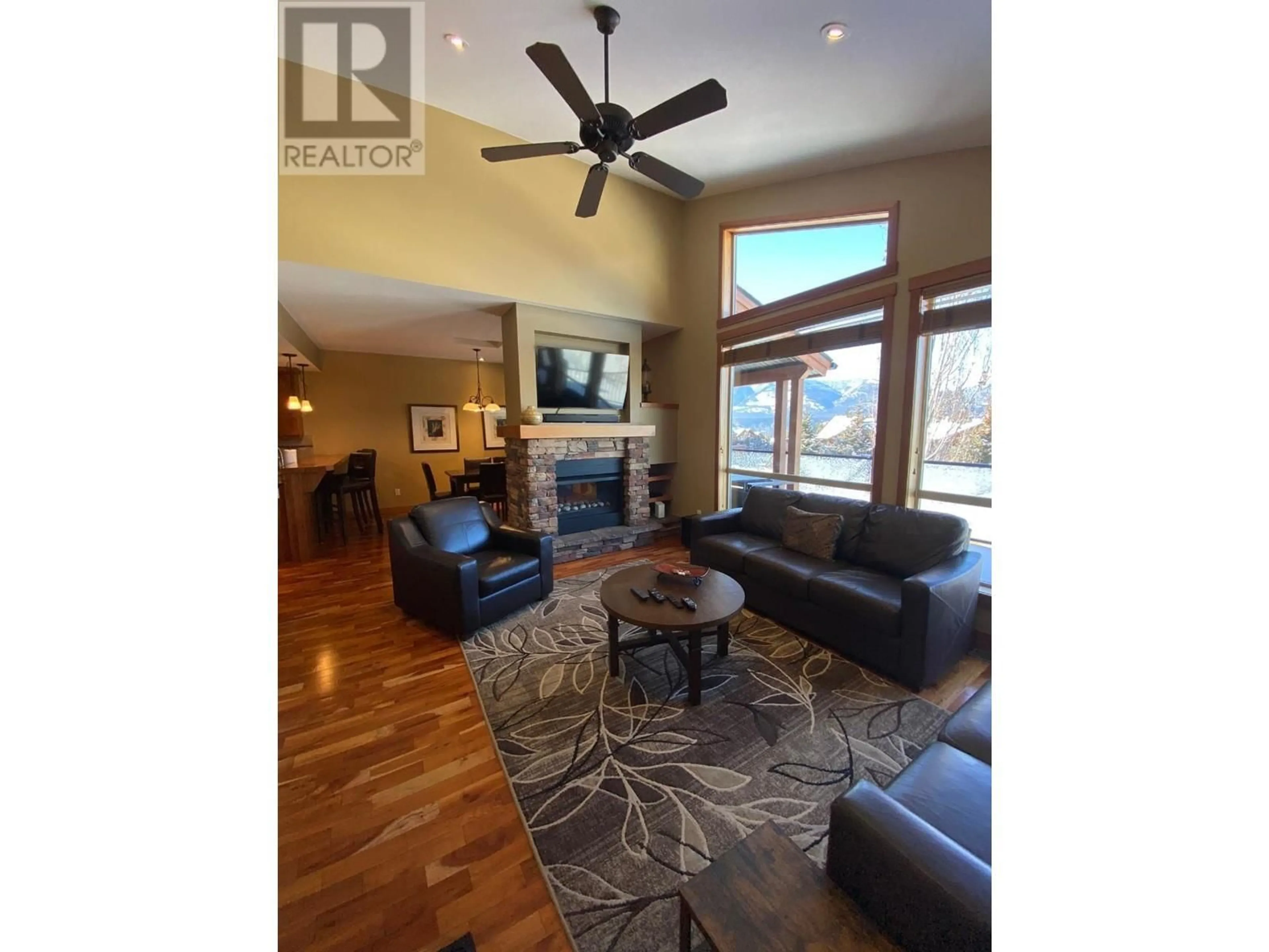 Living room with furniture, wood/laminate floor for 14 D4 - 5150 FAIRWAY DRIVE, Fairmont Hot Springs British Columbia V0B1L1