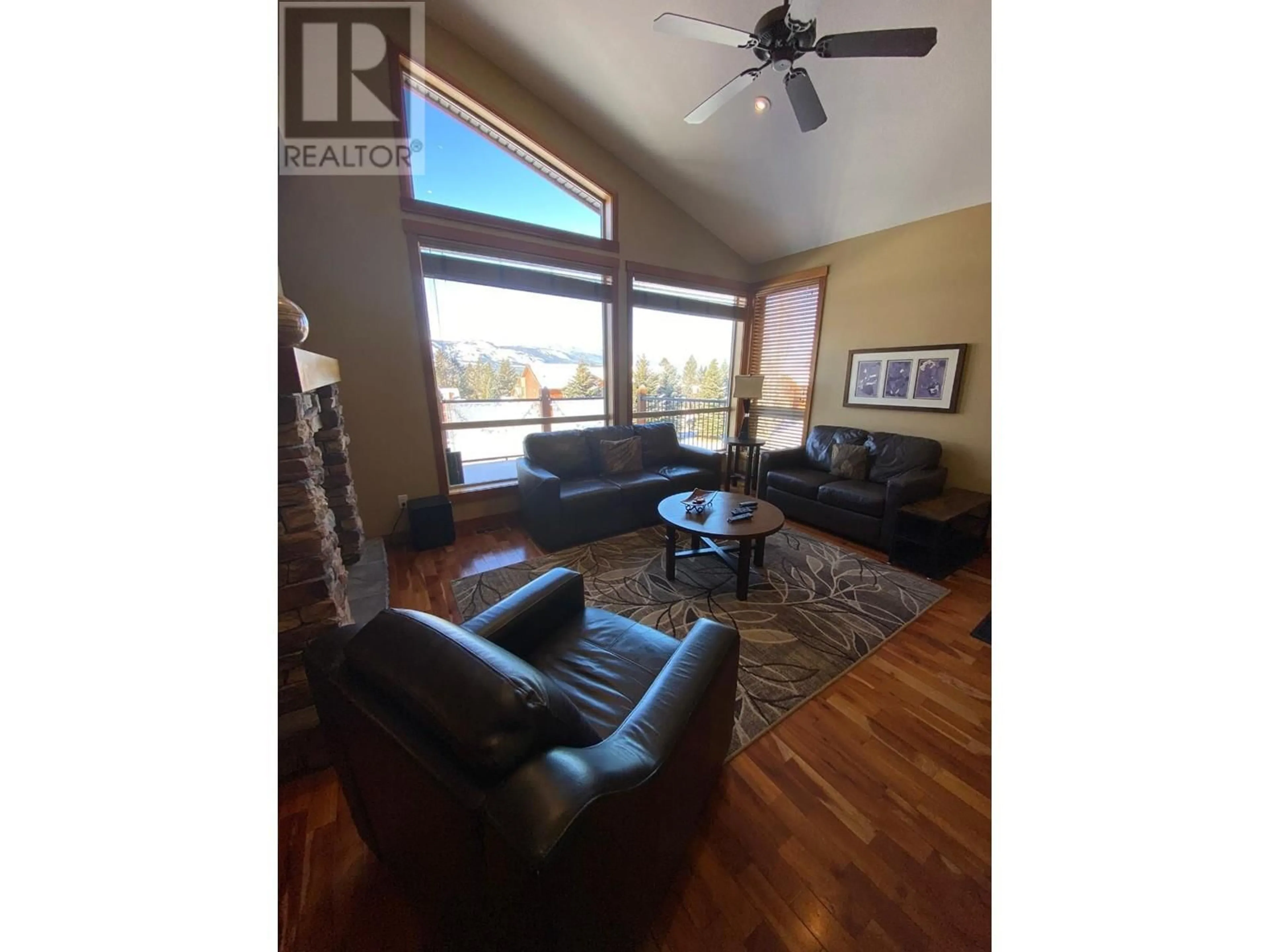 Living room with furniture, wood/laminate floor for 14 D4 - 5150 FAIRWAY DRIVE, Fairmont Hot Springs British Columbia V0B1L1