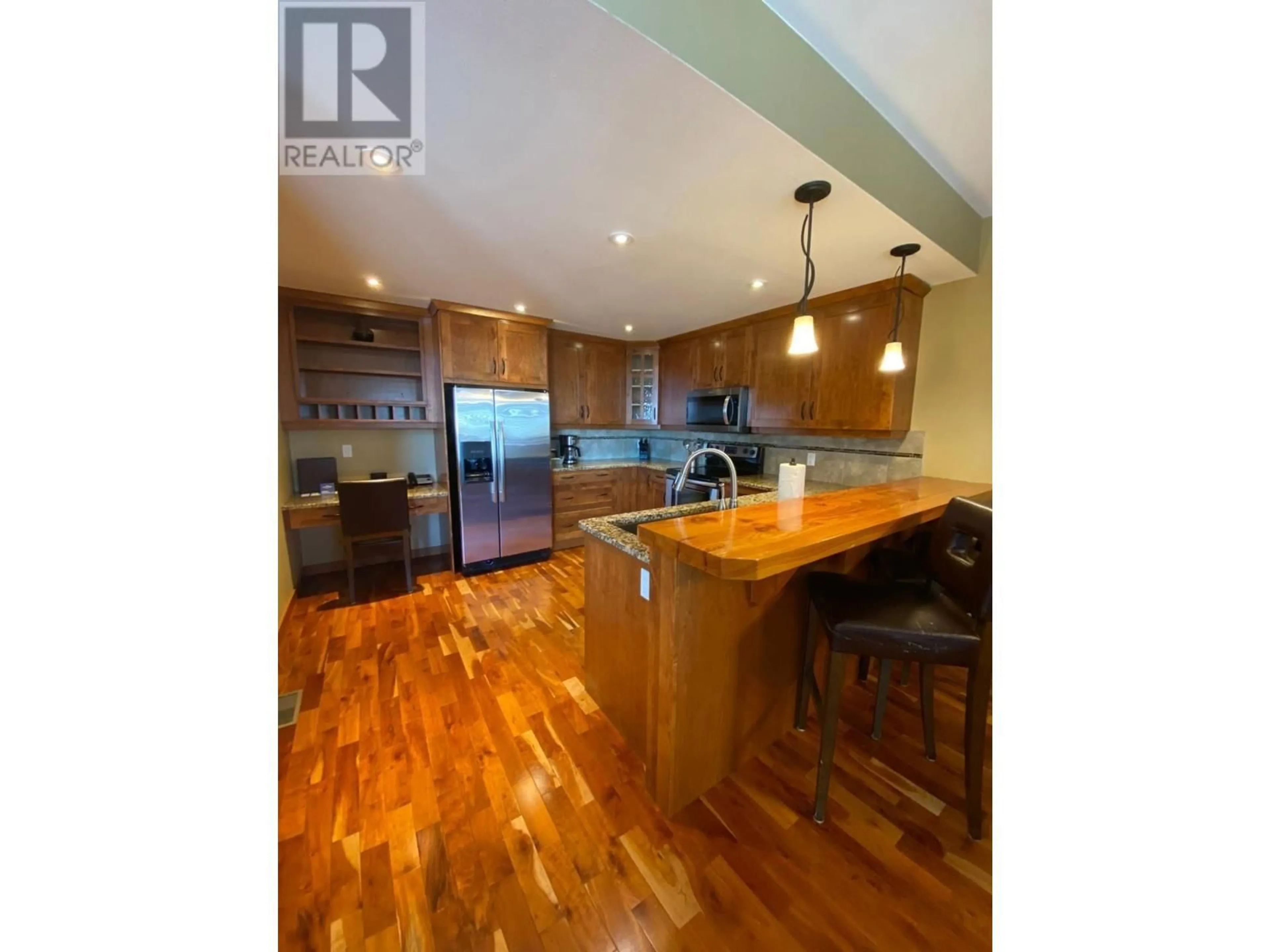 Open concept kitchen, wood/laminate floor for 14 D4 - 5150 FAIRWAY DRIVE, Fairmont Hot Springs British Columbia V0B1L1