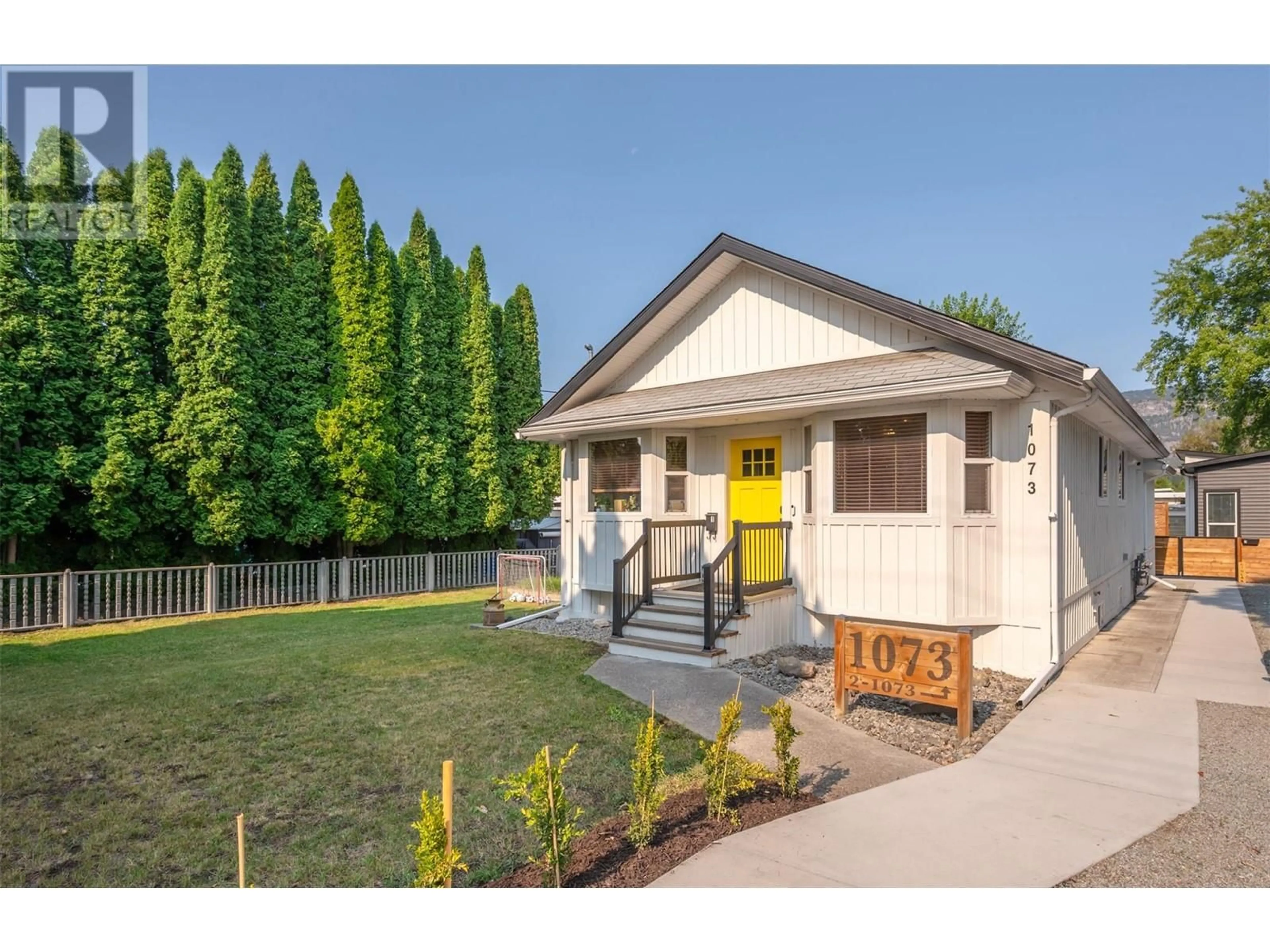 Home with vinyl exterior material, street for 1073 MOOSEJAW STREET, Penticton British Columbia V2A5T5
