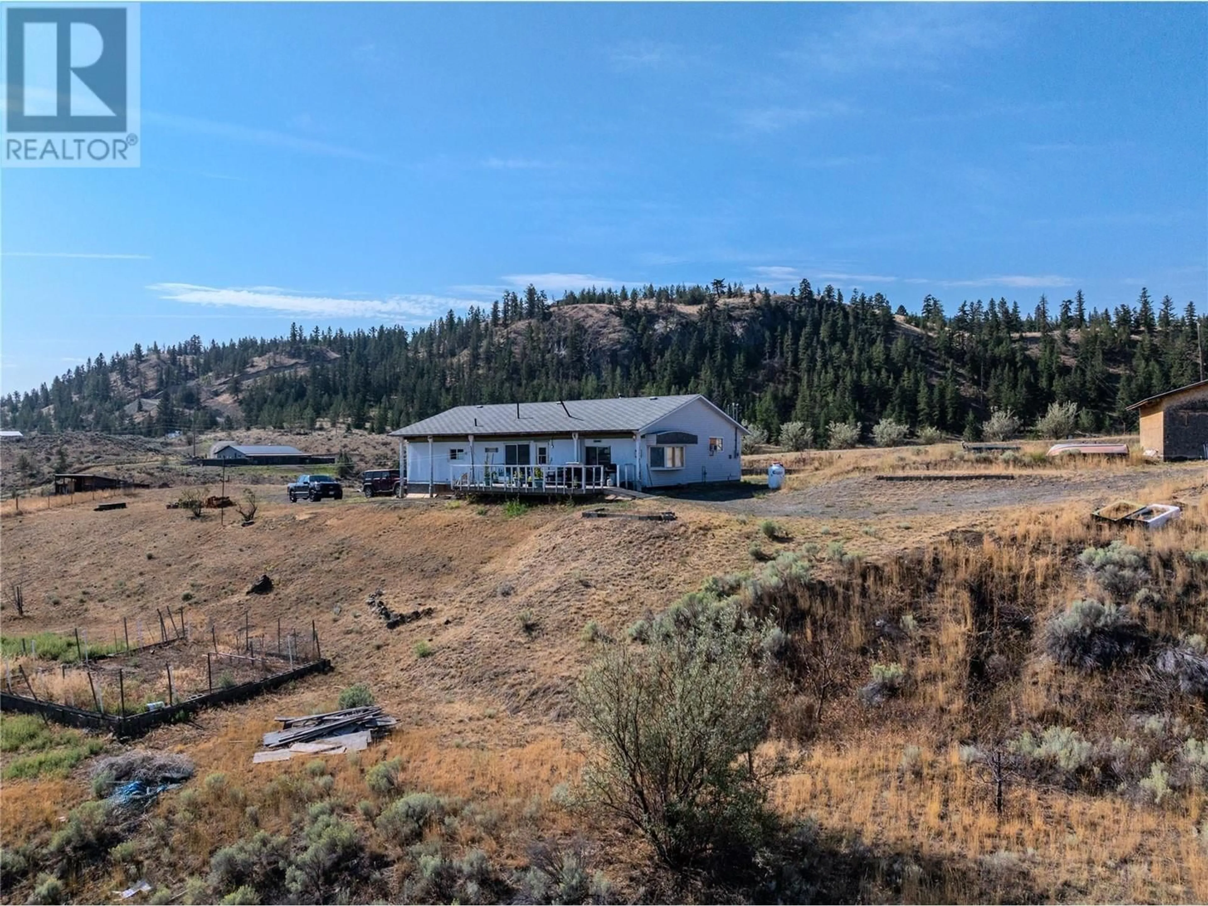 A pic from outside/outdoor area/front of a property/back of a property/a pic from drone, mountain view for 5589 BEATON ROAD, Kamloops British Columbia V1S2A4