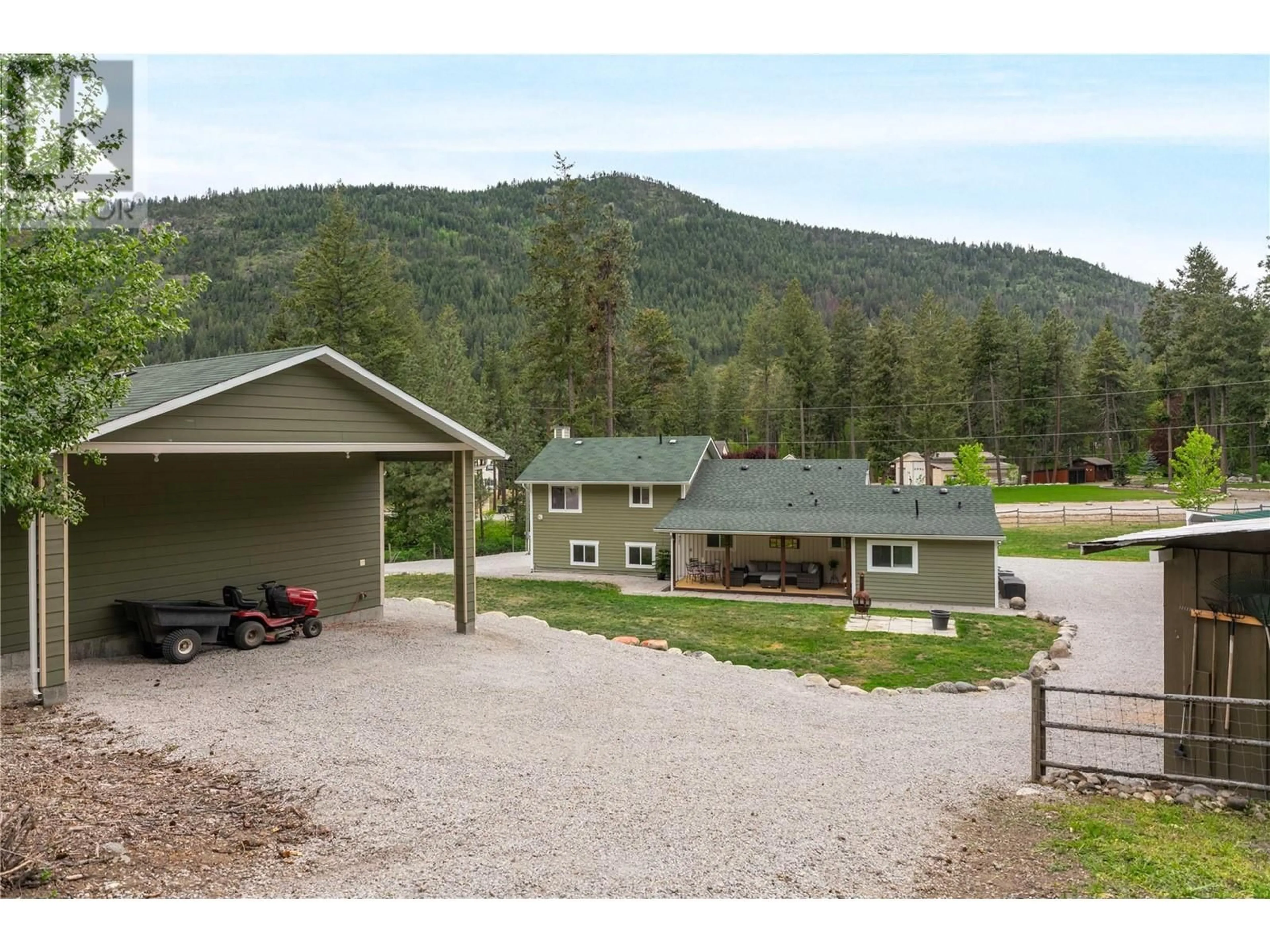 A pic from outside/outdoor area/front of a property/back of a property/a pic from drone, mountain view for 4635 TREPANIER ROAD, Peachland British Columbia V0H1X3