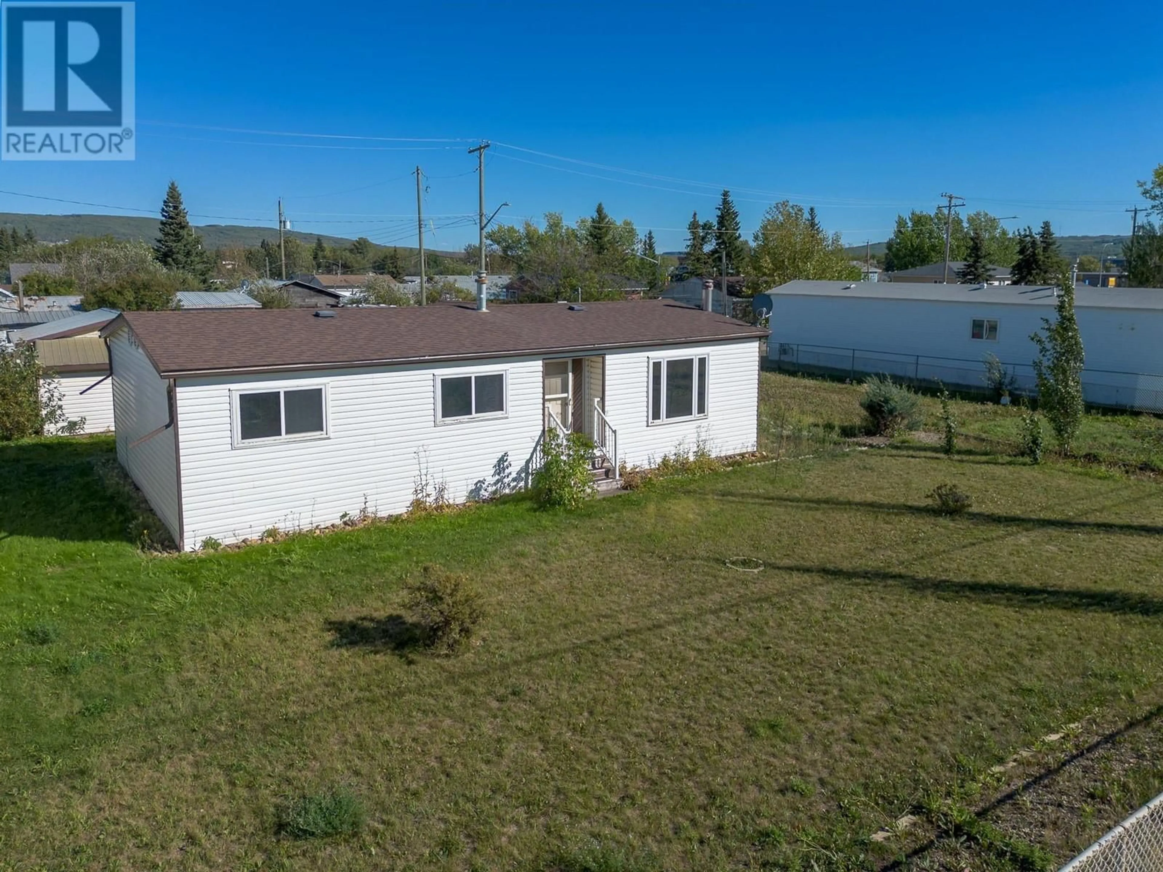 A pic from outside/outdoor area/front of a property/back of a property/a pic from drone, unknown for 5109 SUKRIT PARMAR LANE, Pouce Coupe British Columbia V0C2C0