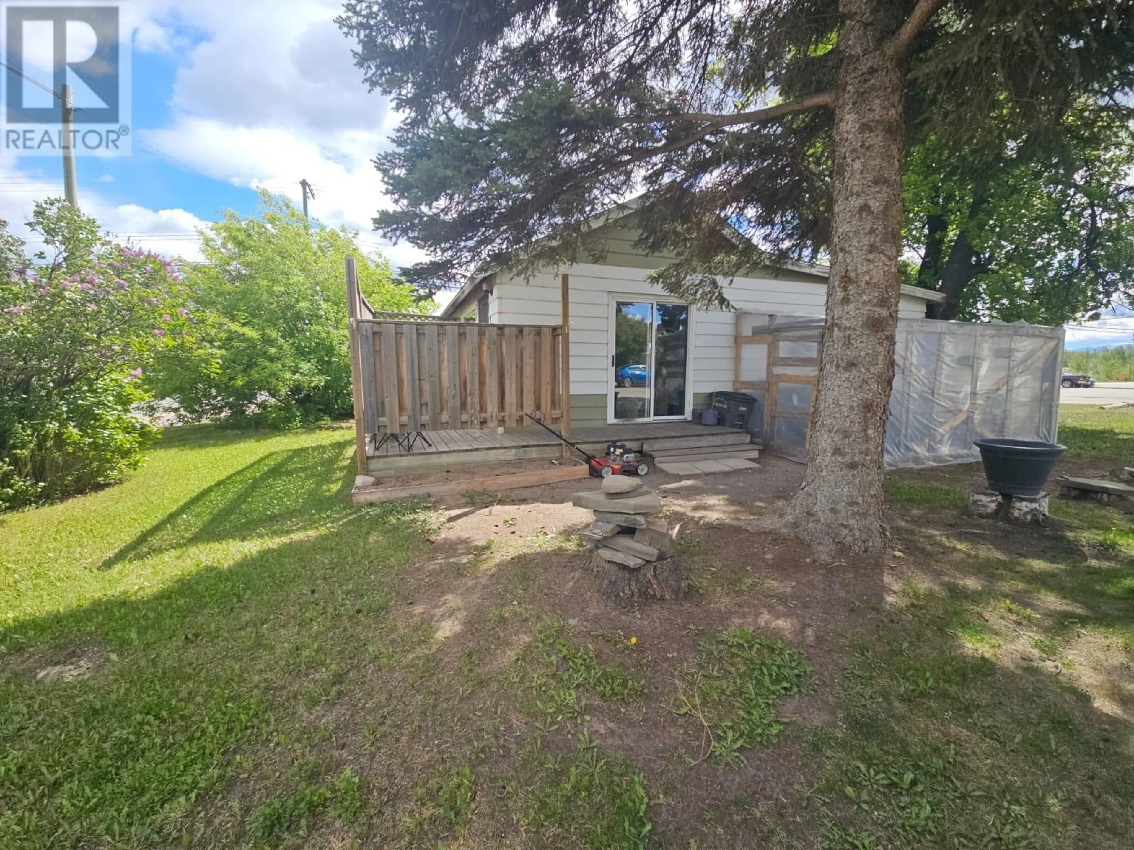 A pic from outside/outdoor area/front of a property/back of a property/a pic from drone, street for 5005 49 AVENUE NORTHWEST, Chetwynd British Columbia V0C1J0