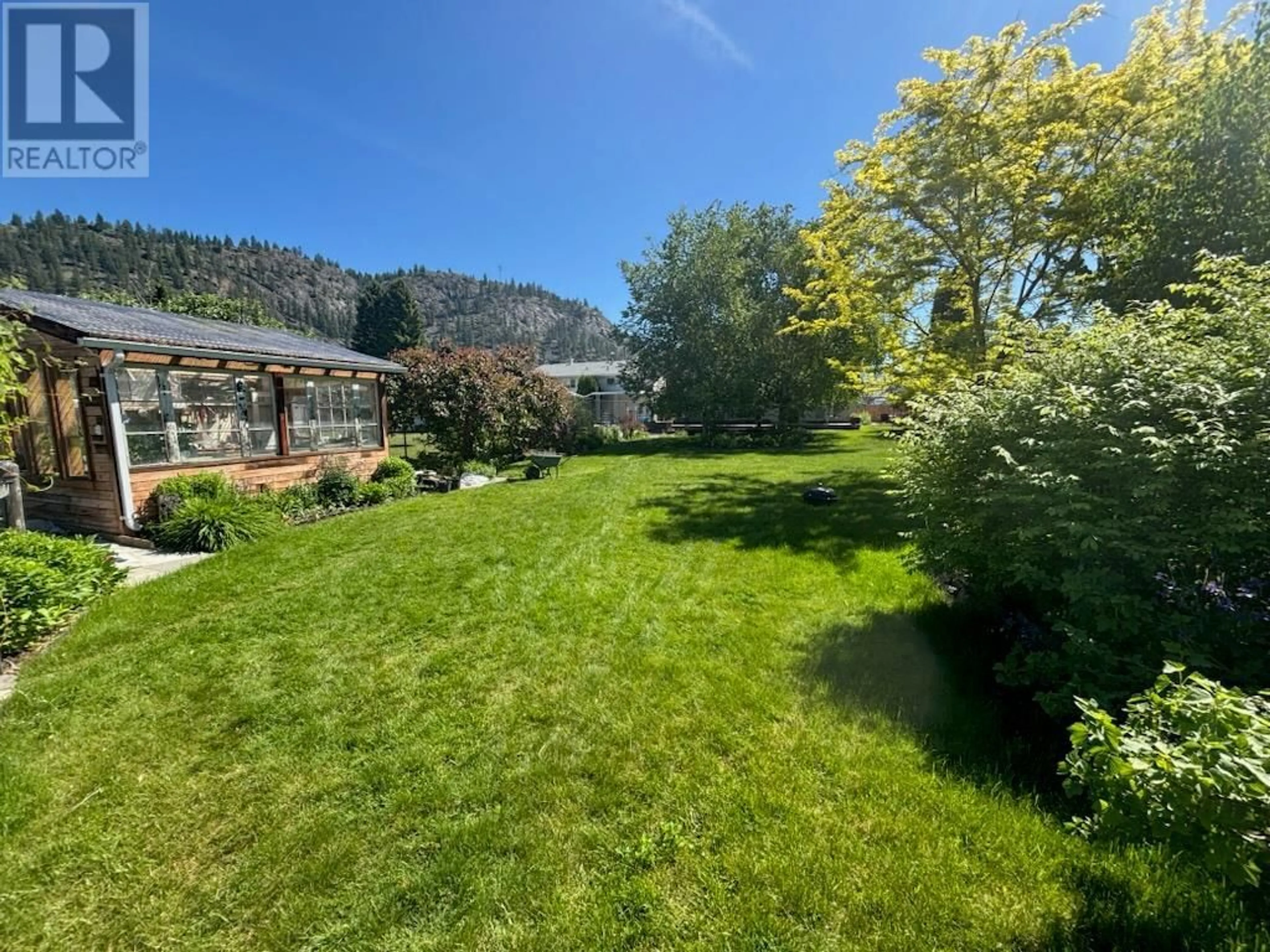 A pic from outside/outdoor area/front of a property/back of a property/a pic from drone, unknown for 7749 17TH STREET, Grand Forks British Columbia V0H1H2