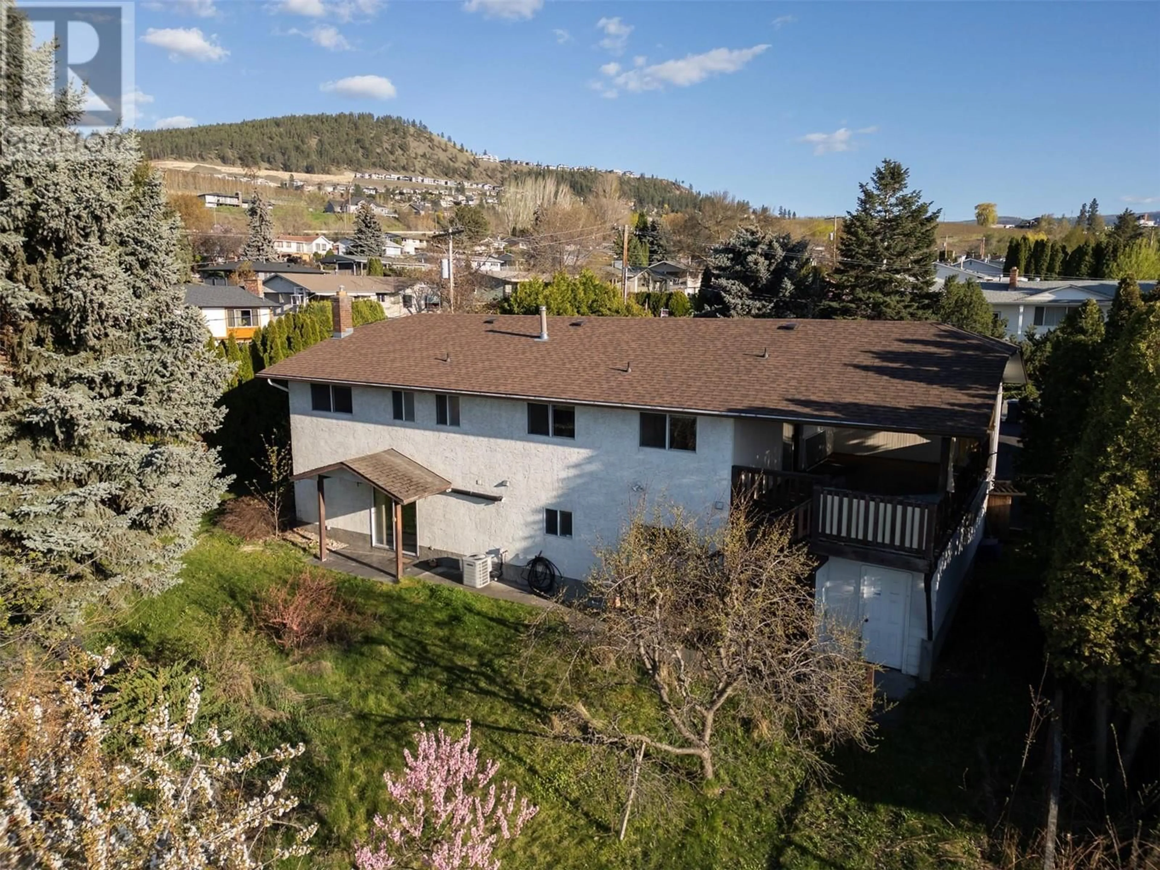 A pic from outside/outdoor area/front of a property/back of a property/a pic from drone, mountain view for 410 SEAFORD ROAD, Kelowna British Columbia V1X5L4