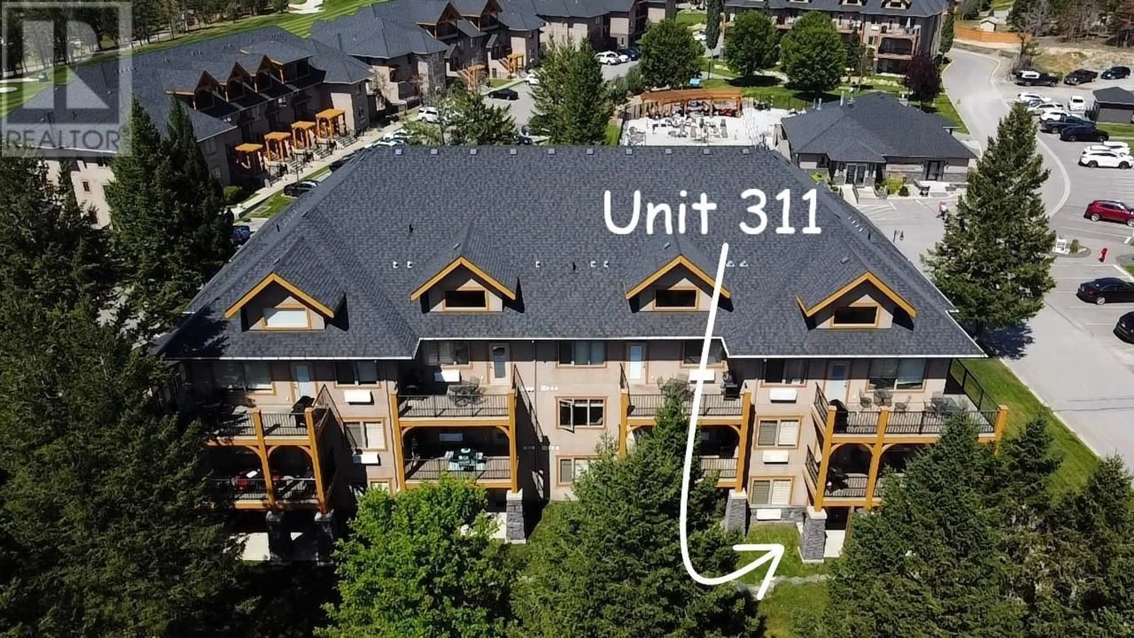 A pic from outside/outdoor area/front of a property/back of a property/a pic from drone, city buildings view from balcony for 311 B - 300 BIGHORN BOULEVARD, Radium Hot Springs British Columbia V0A1M0